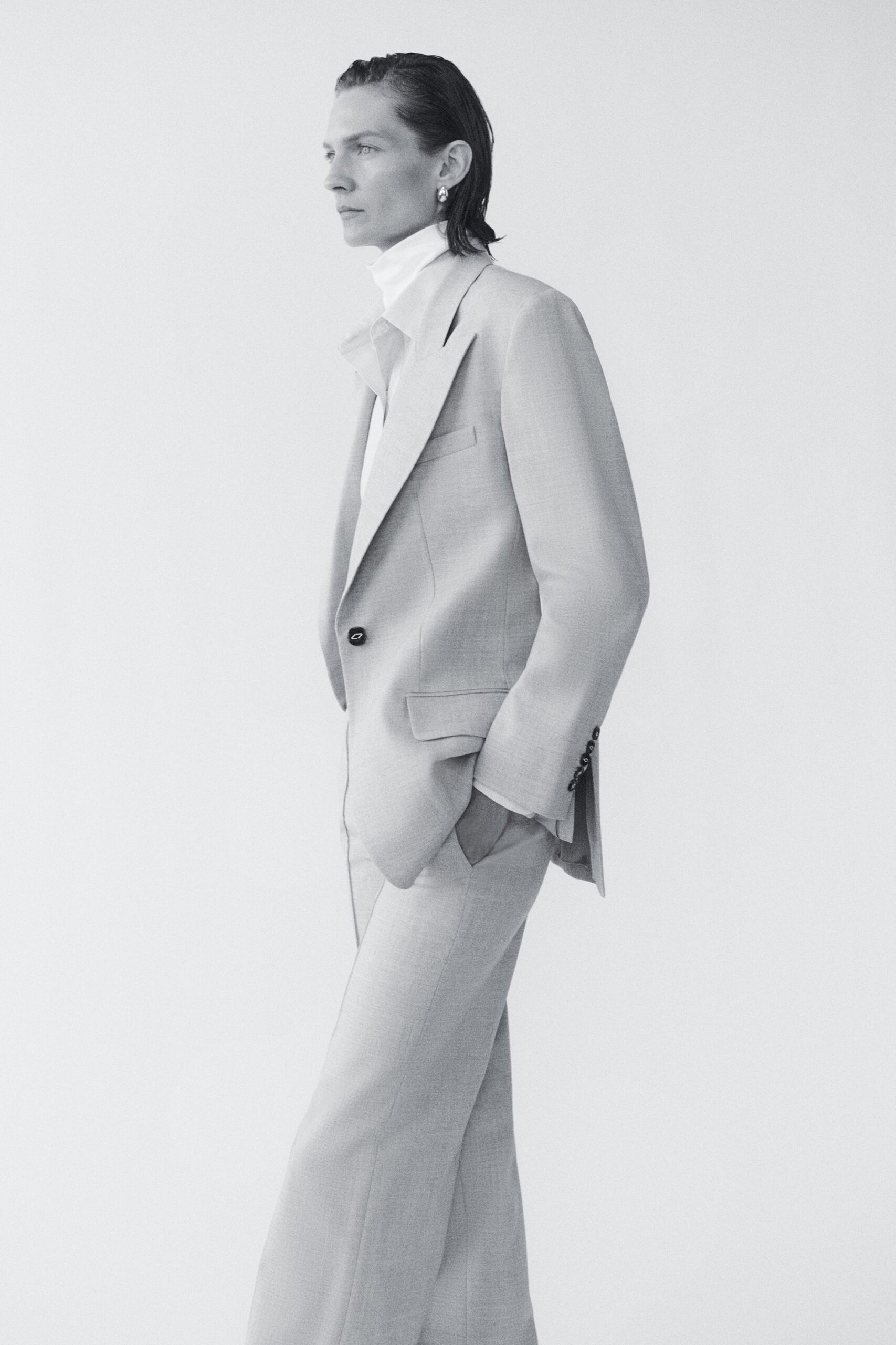 beige wool long-sleeve collared structured pockets buttoned blazer
