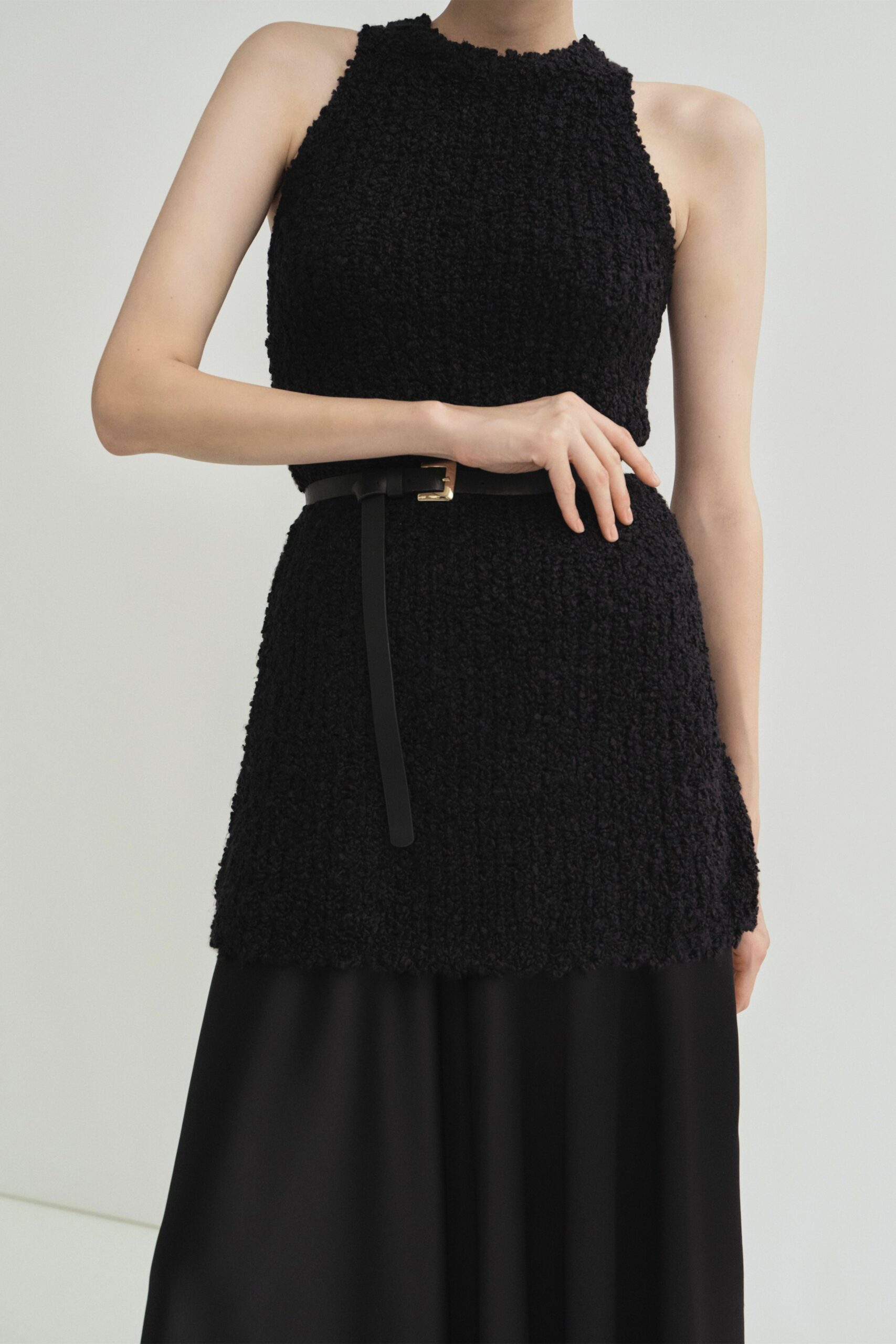 black fitted top with midi skirt