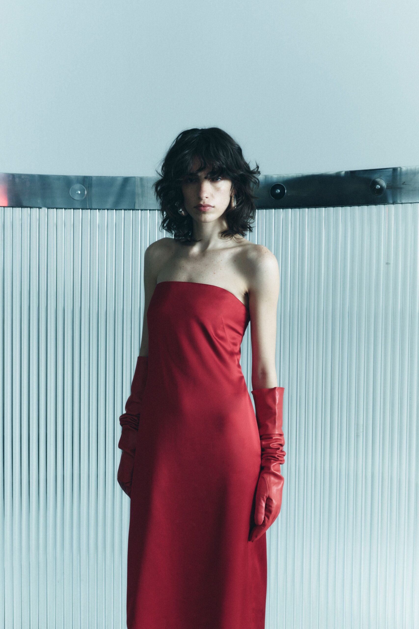 red silk strapless fitted midi dress