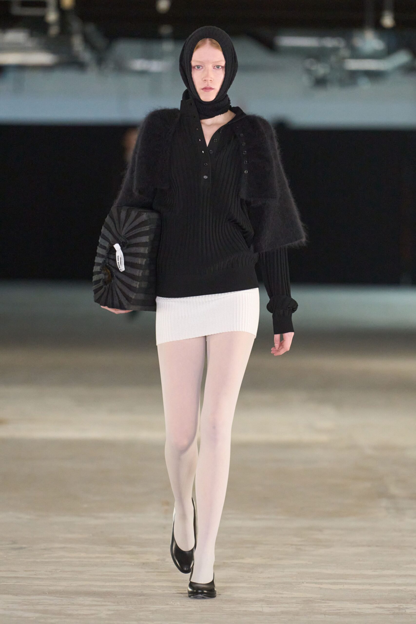 black fitted top with mini skirt