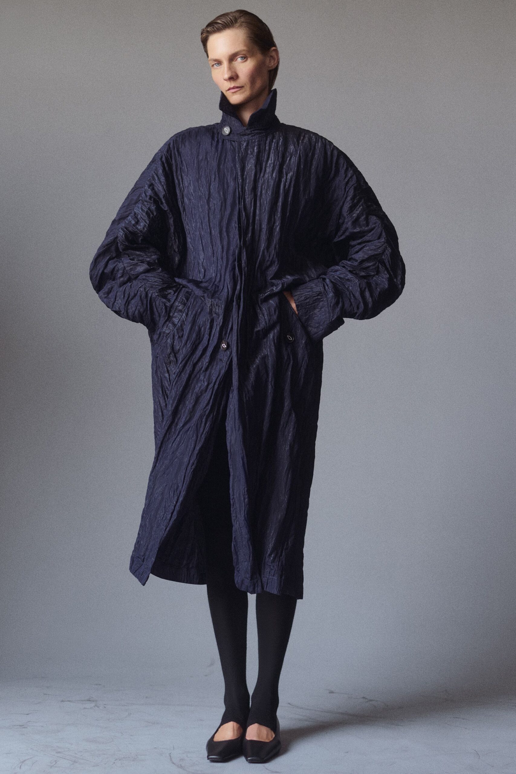 blue silk long-sleeve high-neck oversized buttoned pockets coat