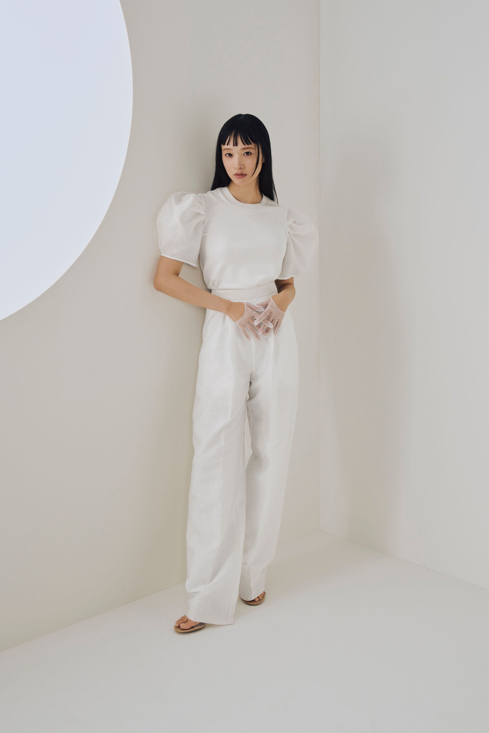 white relaxed jumpsuit with gloves