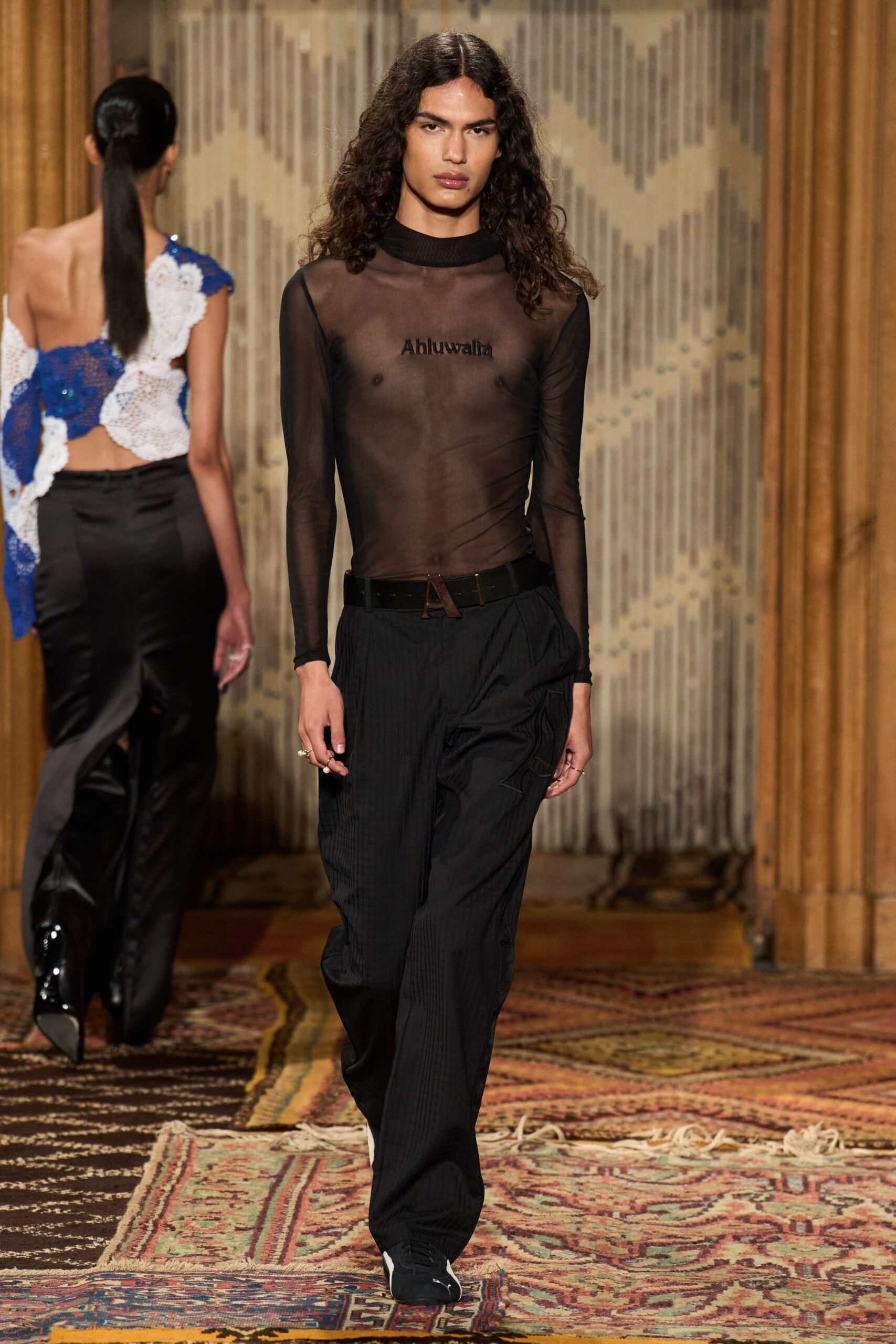 black mesh fitted top with relaxed pants