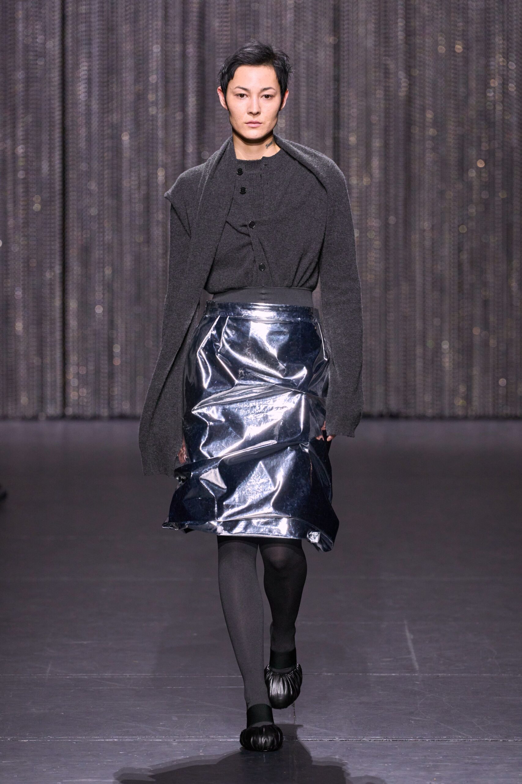 black wool top silver vinyl skirt