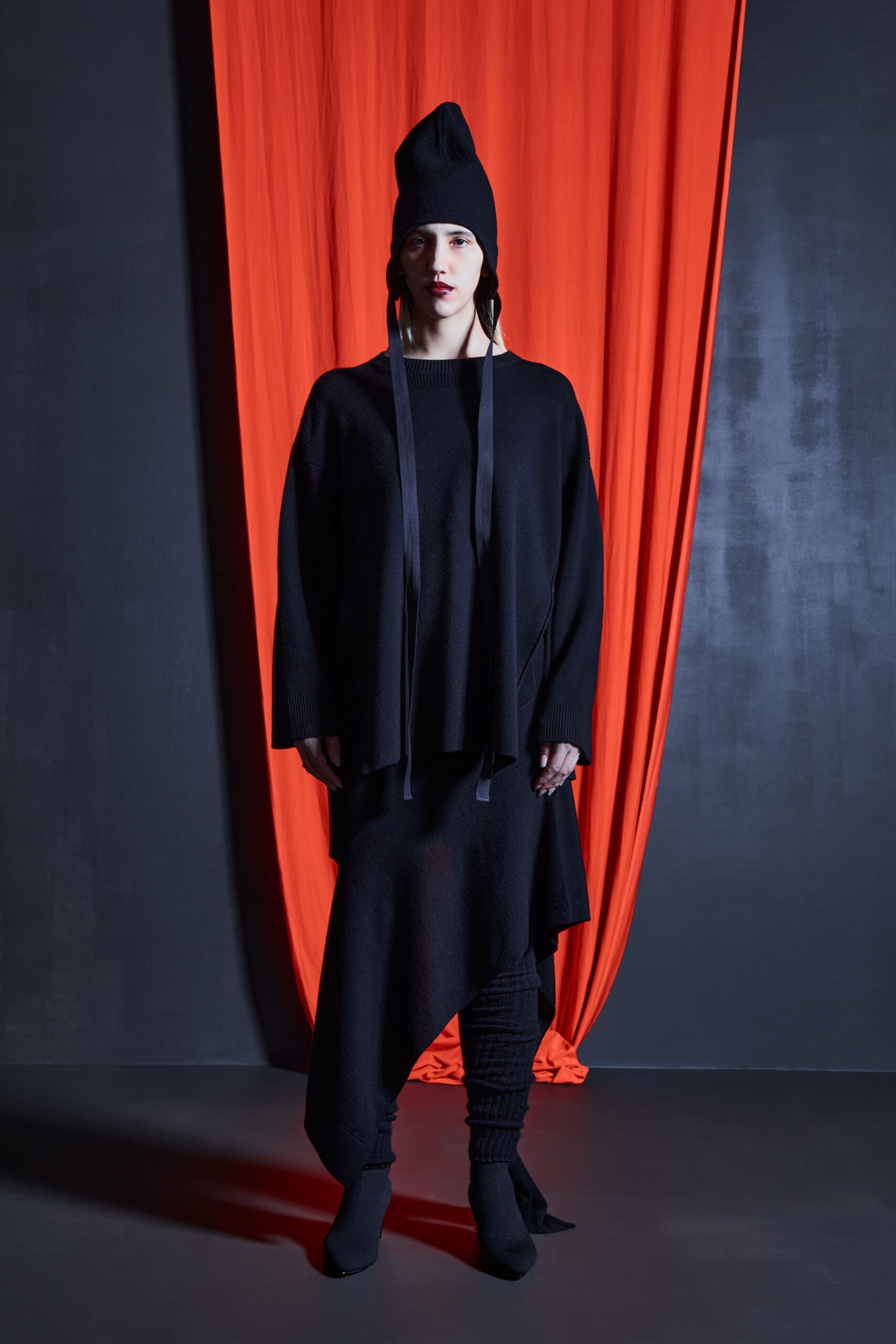 black relaxed asymmetric dress with hat