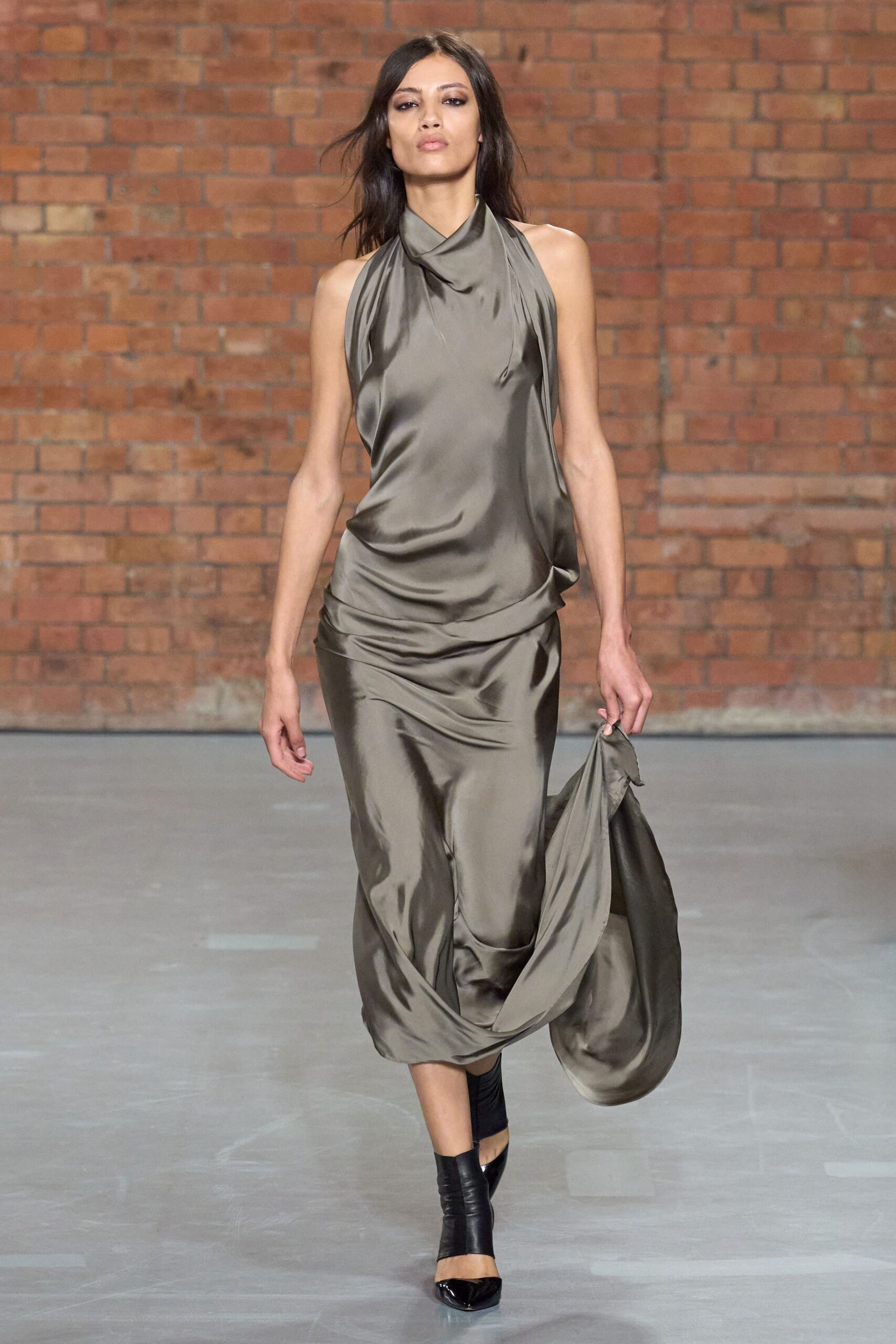 gray silk sleeveless high-neck fitted draped flowing dress