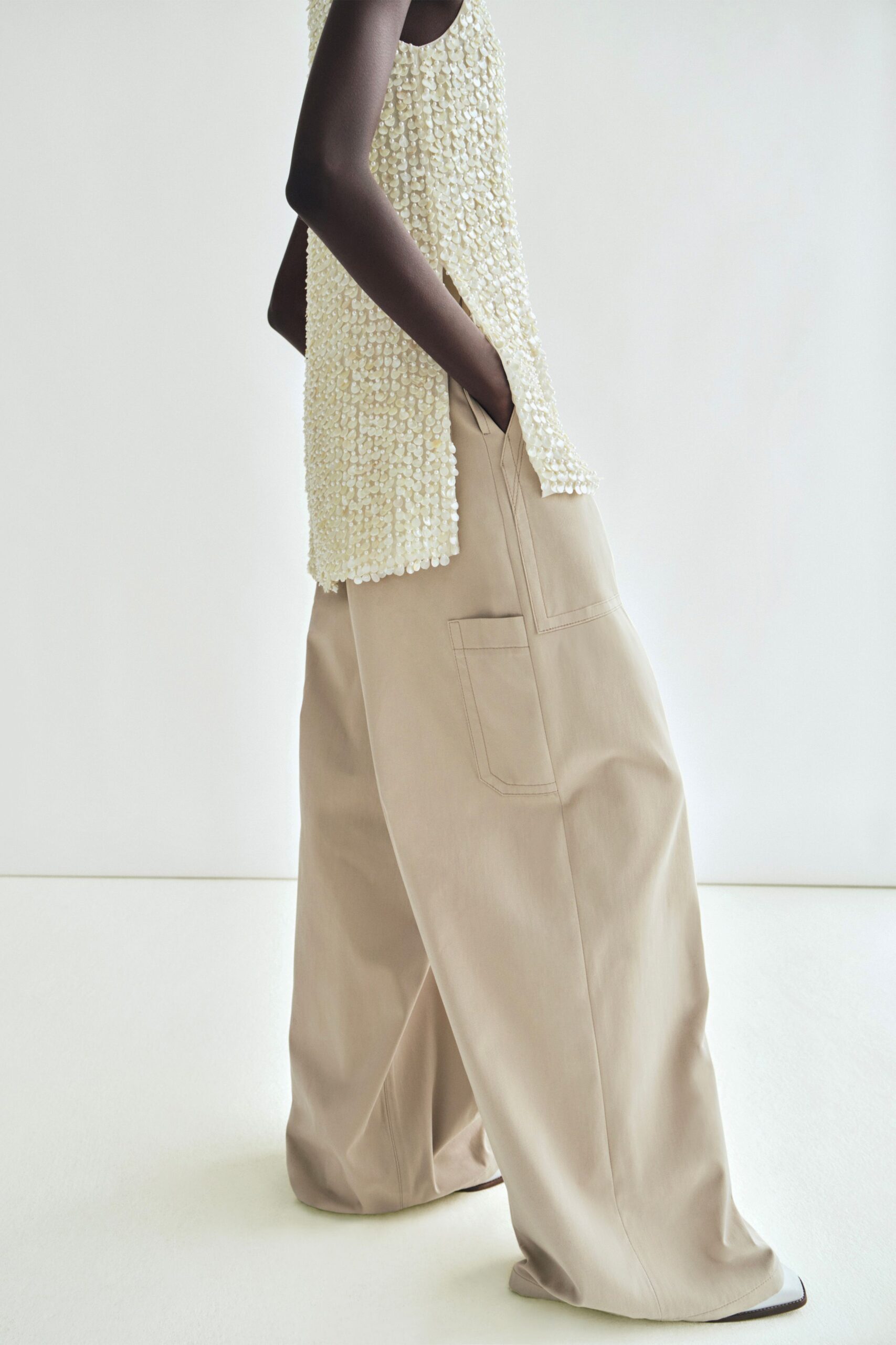 white cotton sleeveless relaxed beaded top