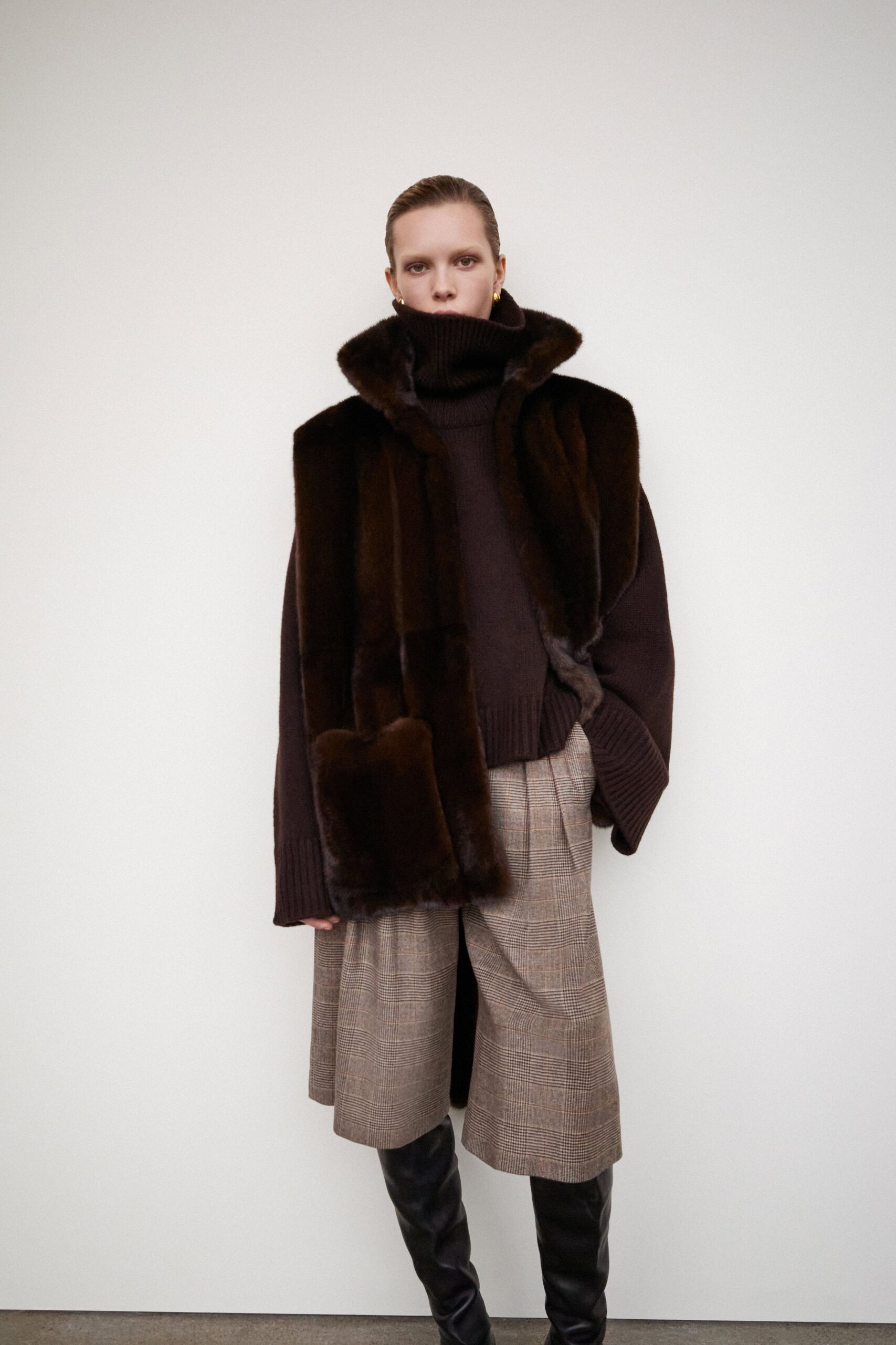 brown sweater with fur vest
