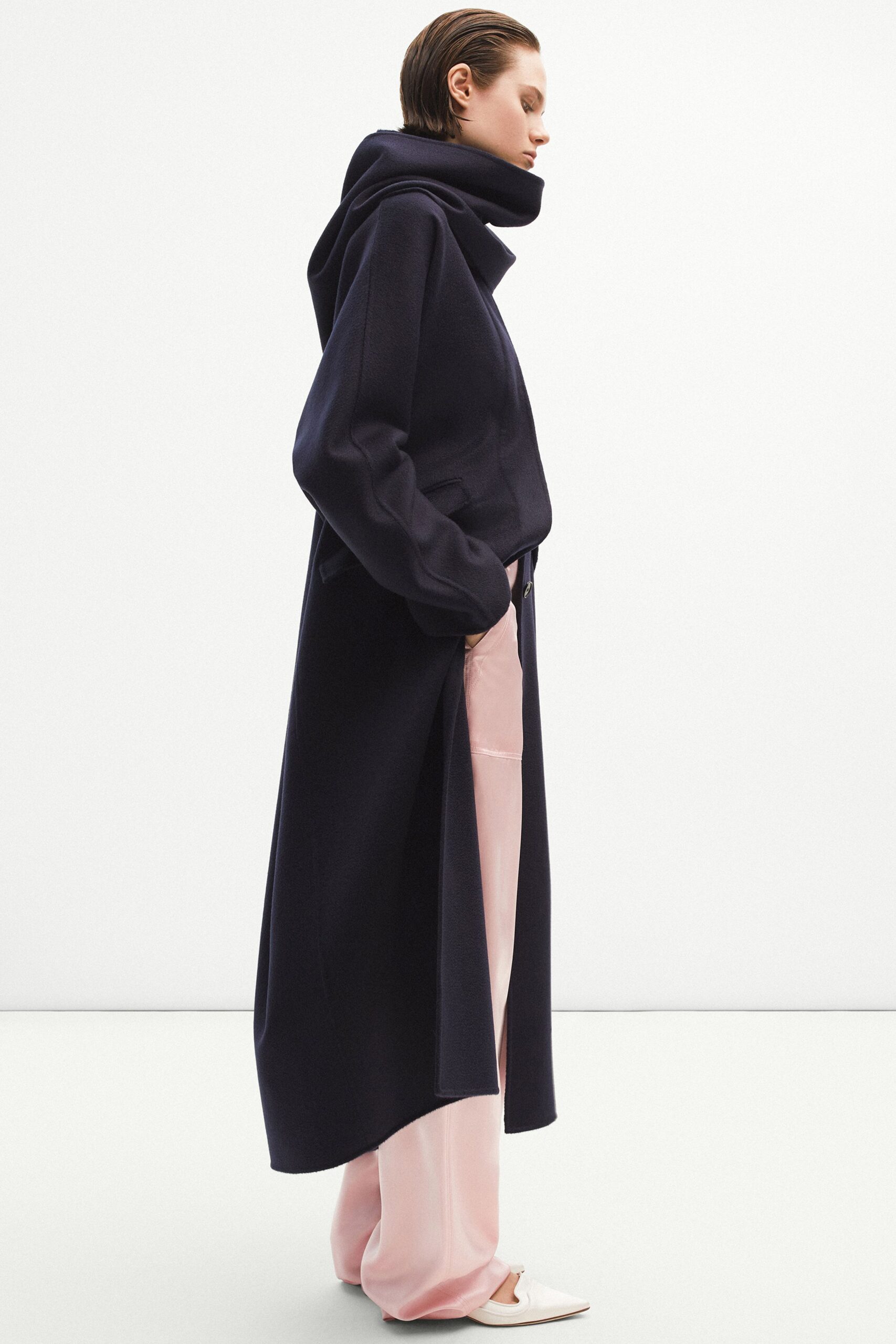 navy coat with pink pants