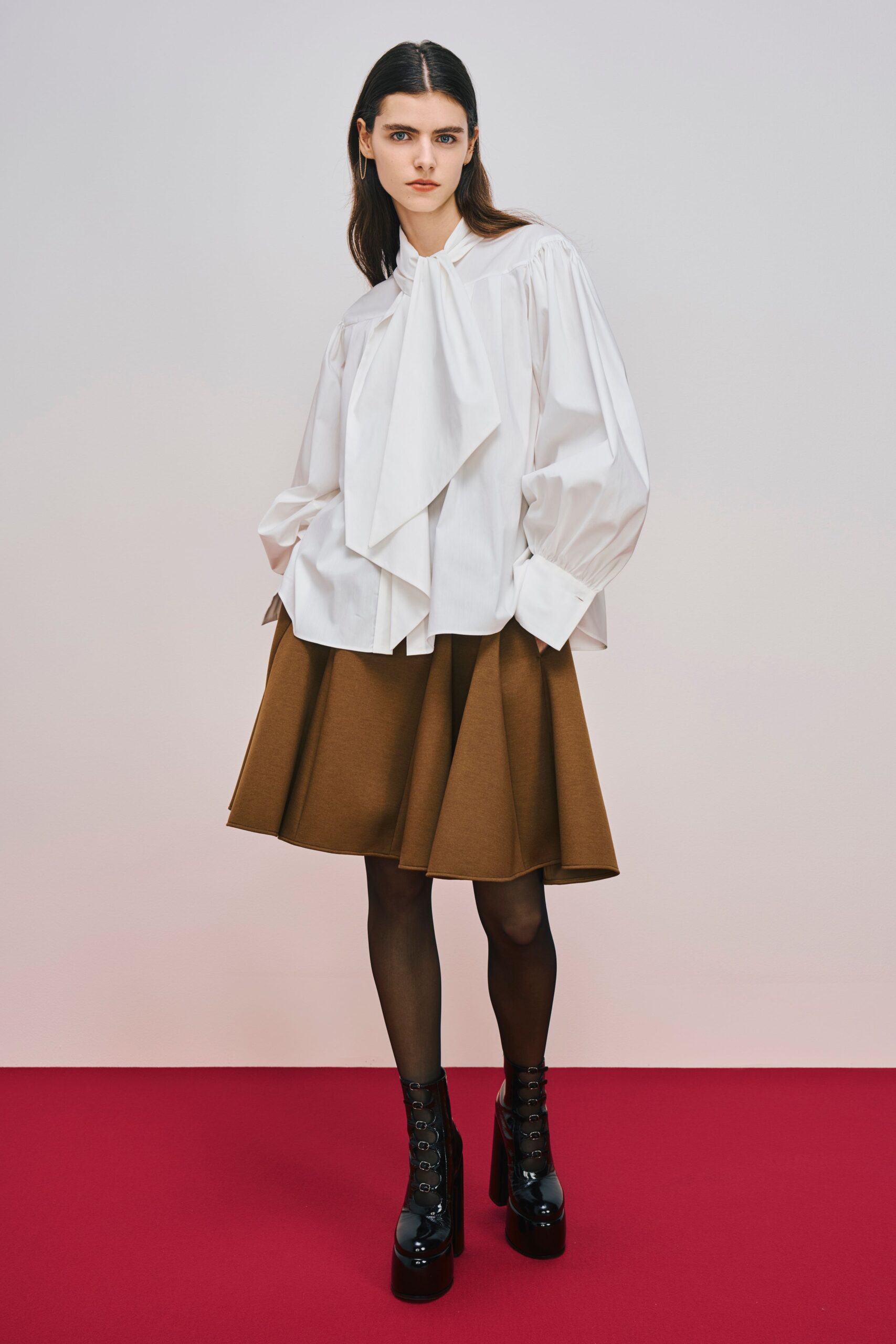 white blouse brown a-line skirt