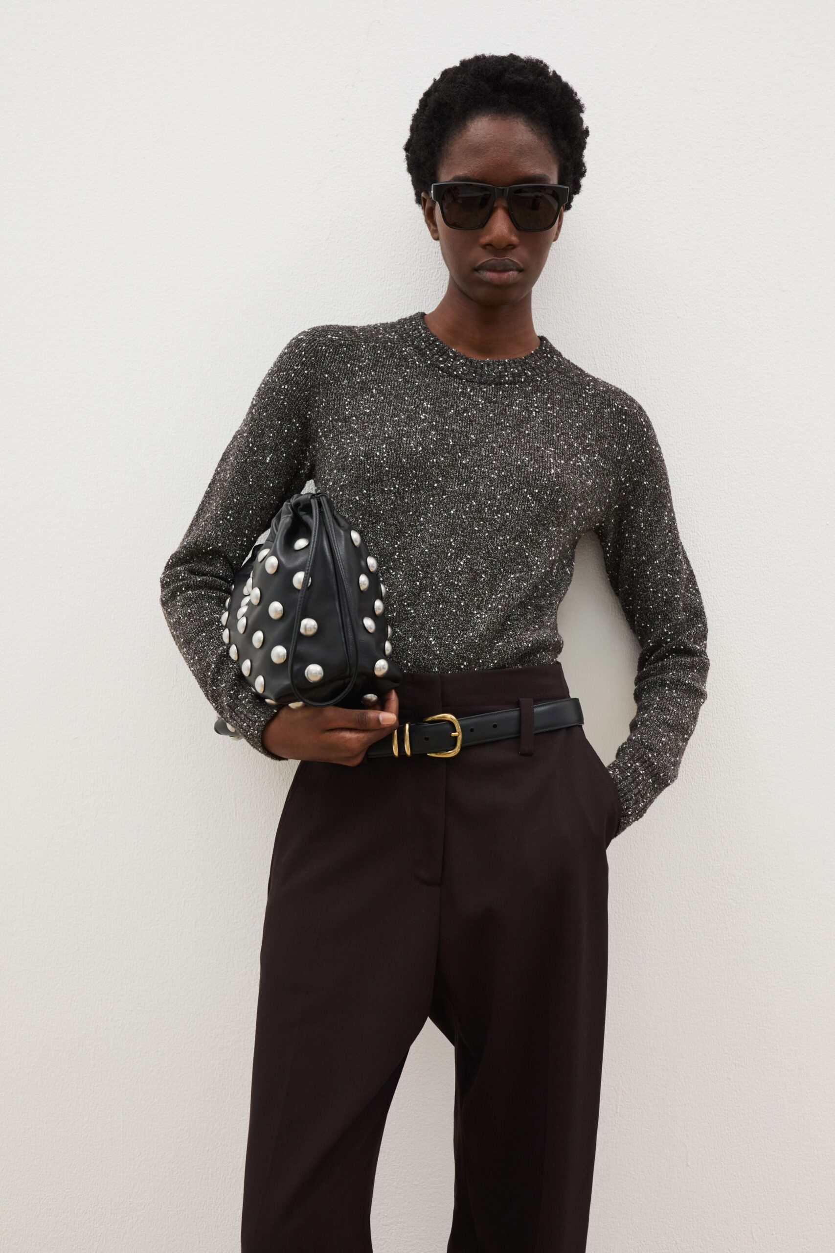 black cotton long-sleeve collared fitted textured top