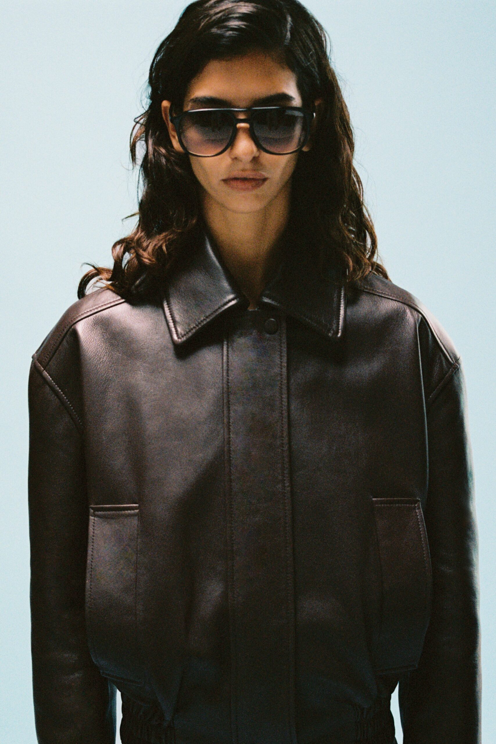 brown leather long-sleeve collared oversized pockets buttoned jacket