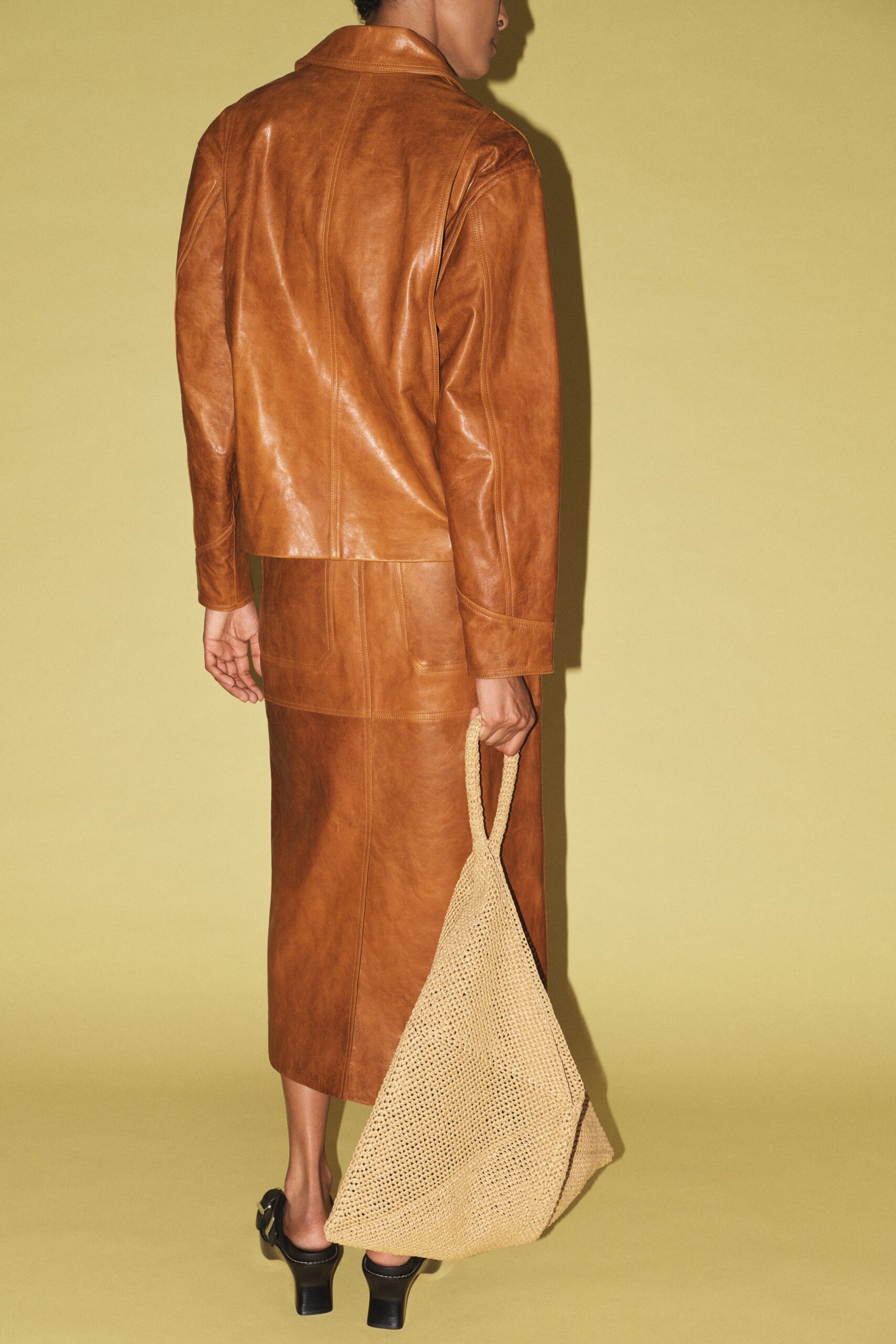 brown leather coat and skirt