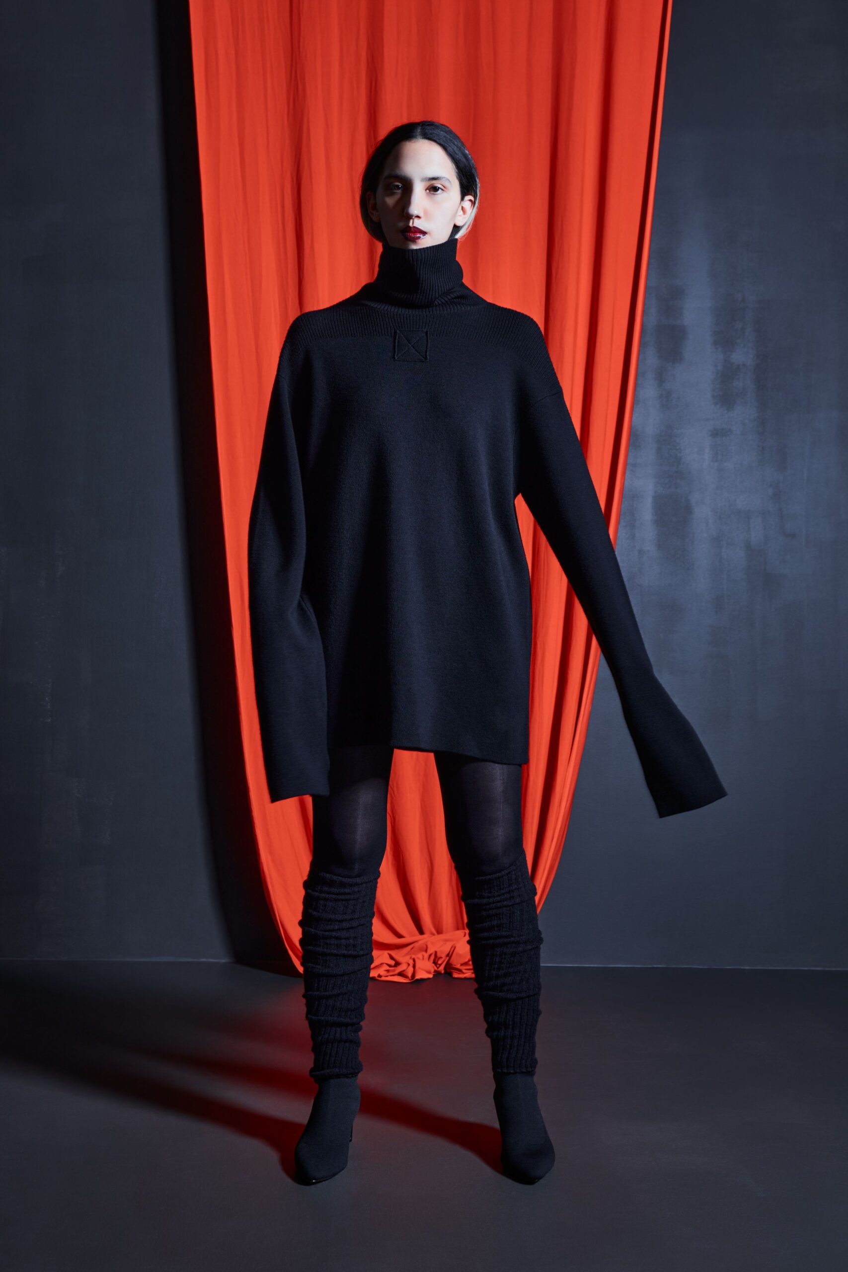 black wool long-sleeve turtleneck oversized short sweater