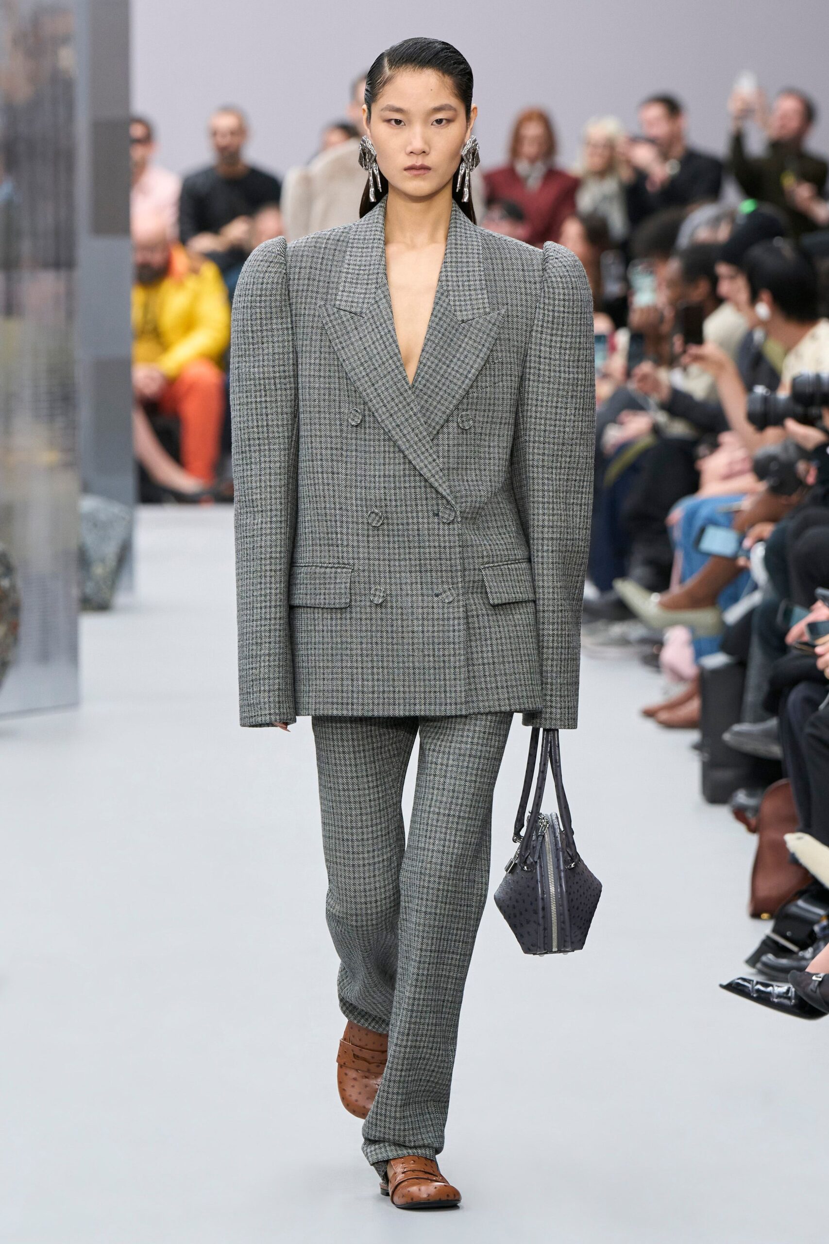 gray tailored suit with brown shoes