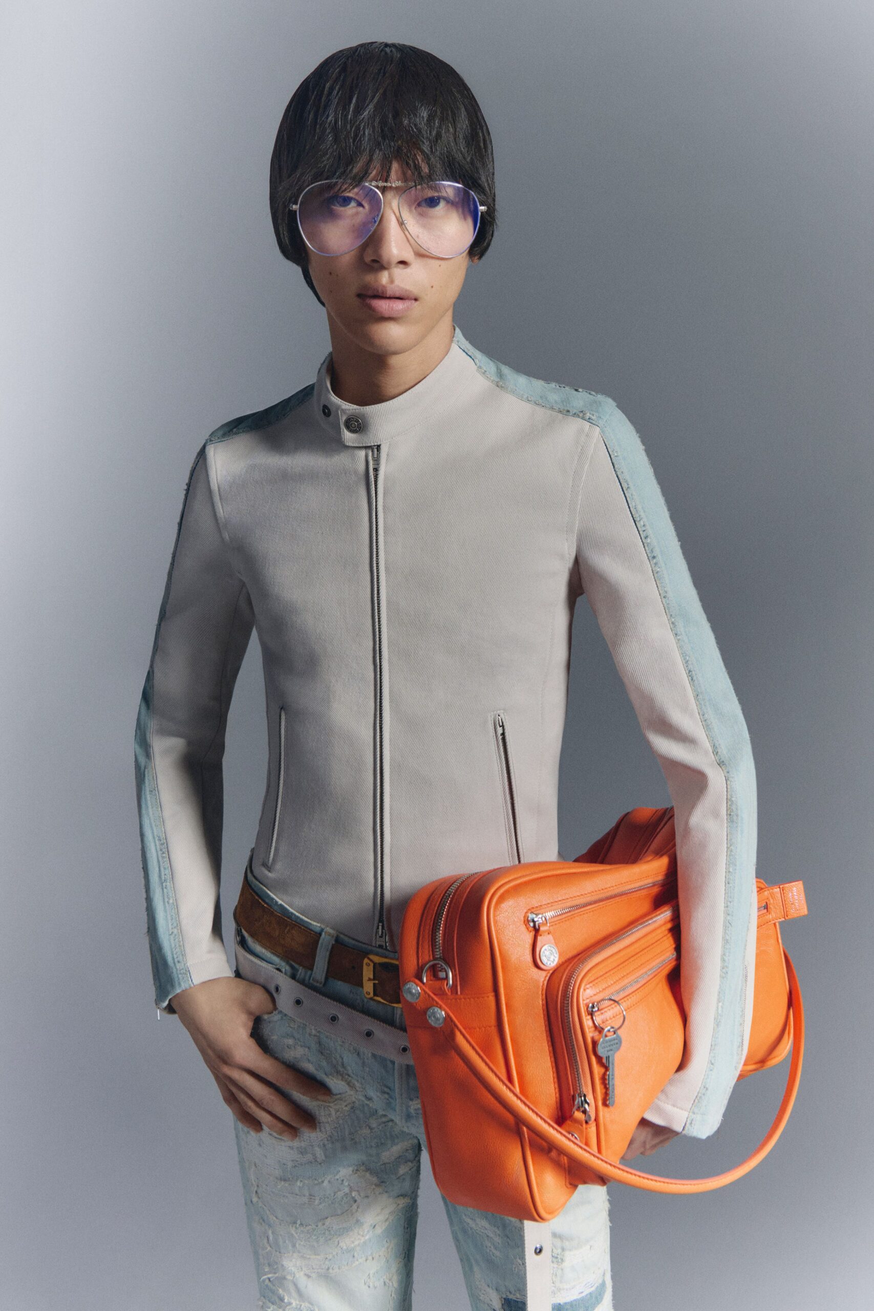 orange leather structured zippered pockets shiny bag