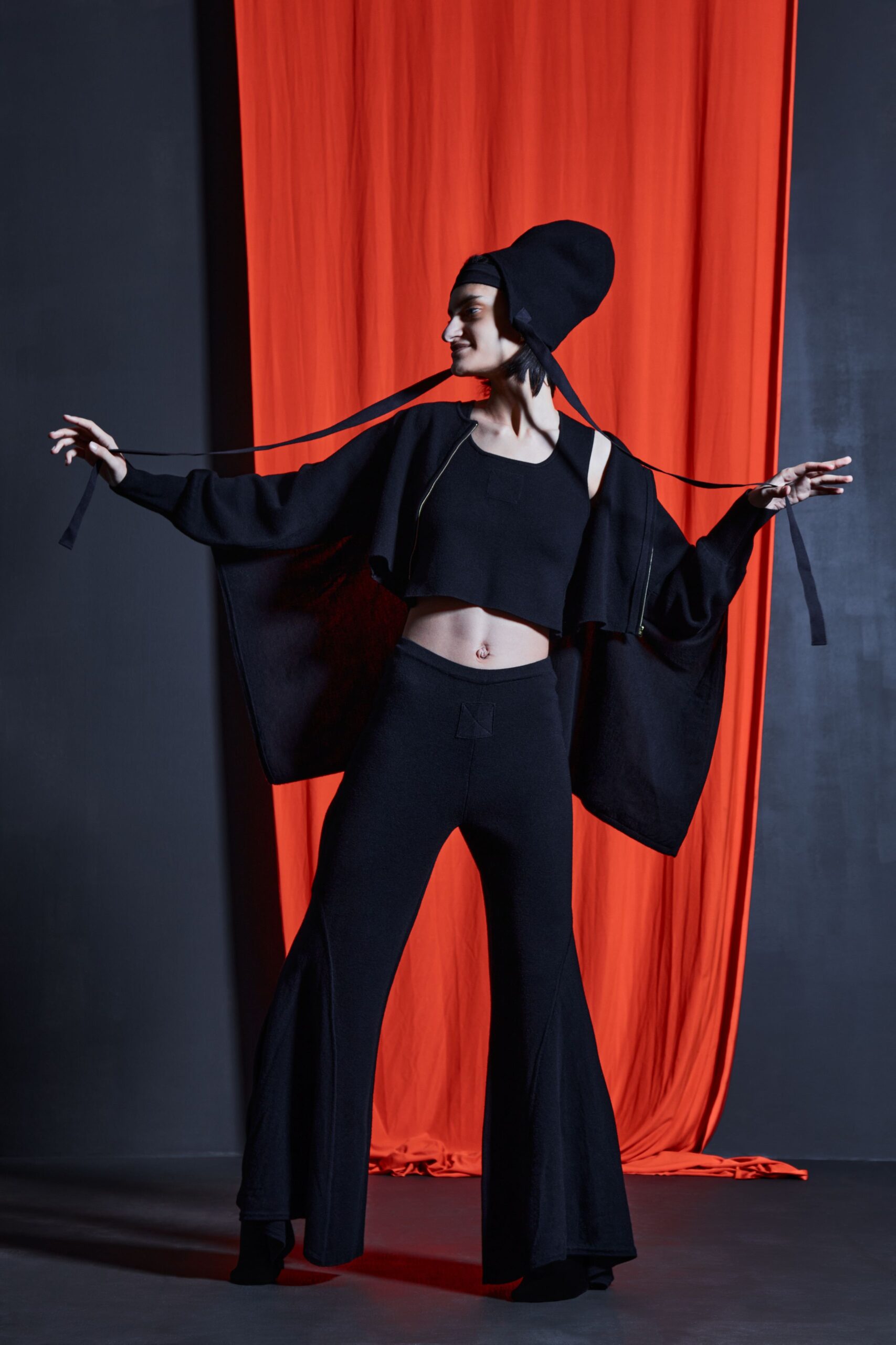 black oversized jacket with flared pants