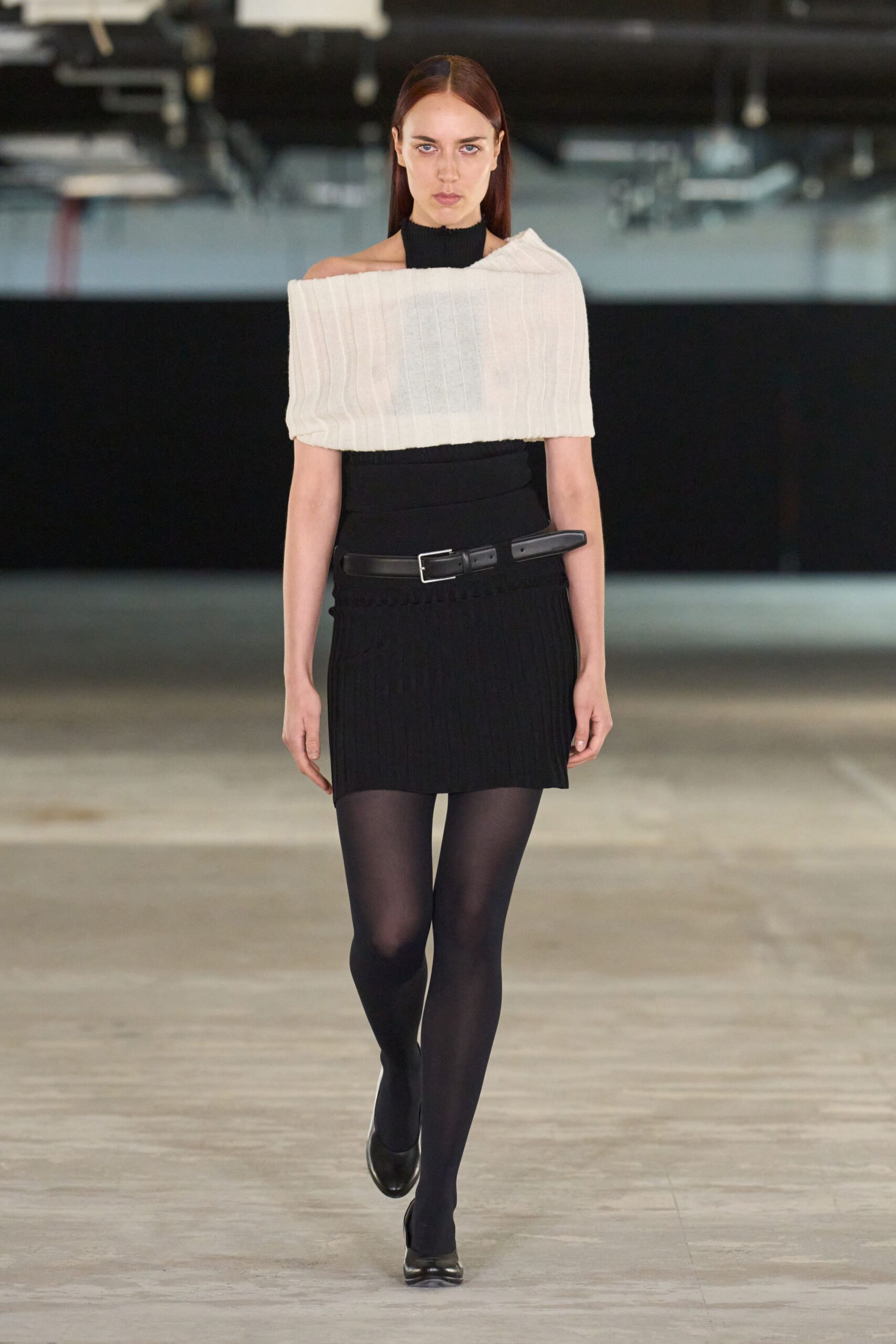 white fitted top black mini skirt