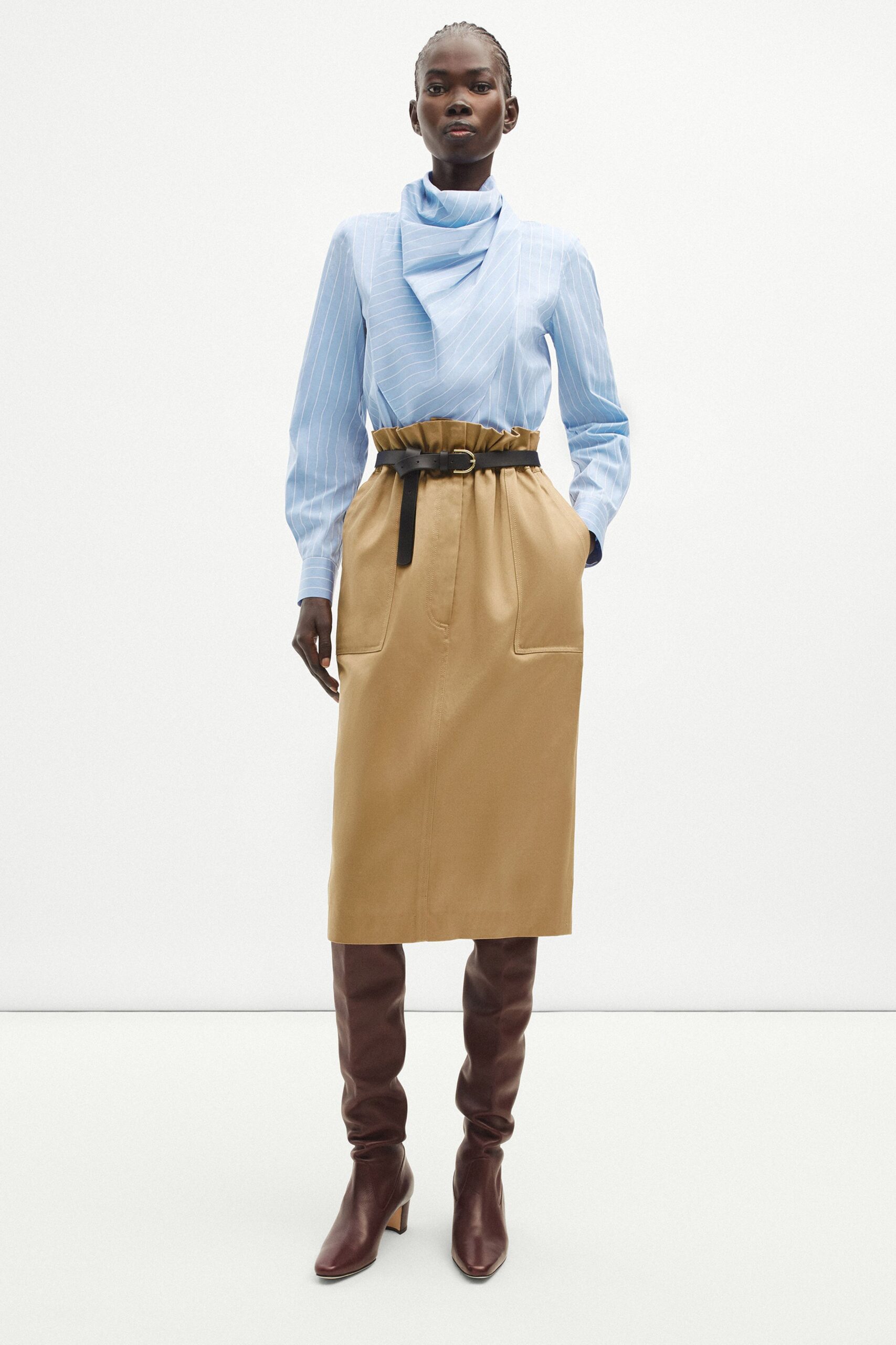 blue striped shirt brown leather skirt
