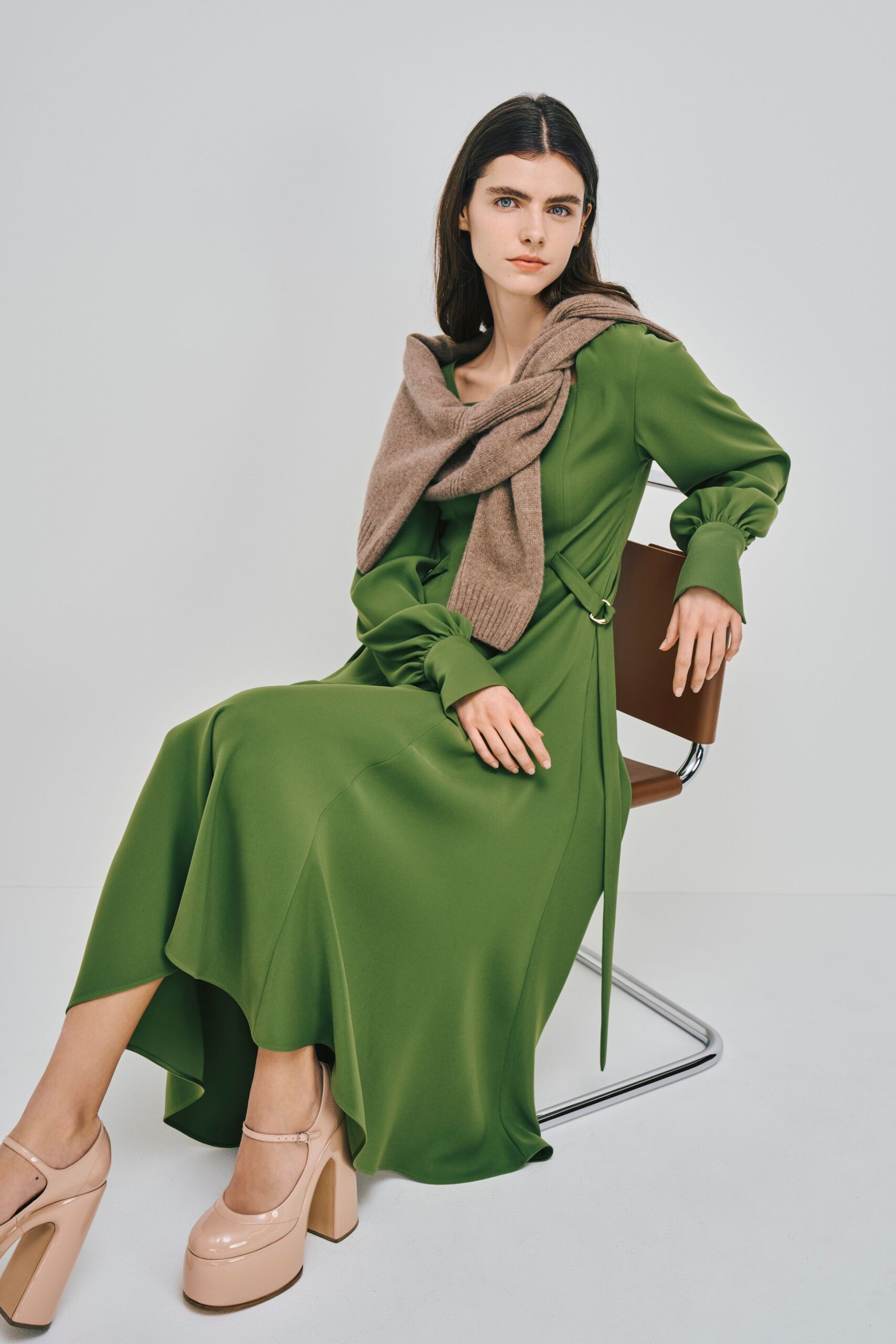 green midi dress with brown sweater