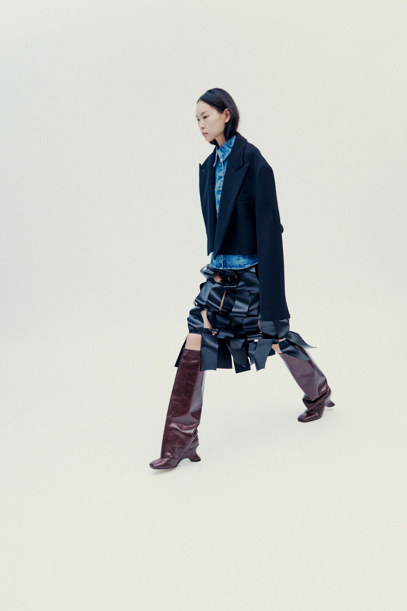 black wool long-sleeve collared oversized buttoned jacket