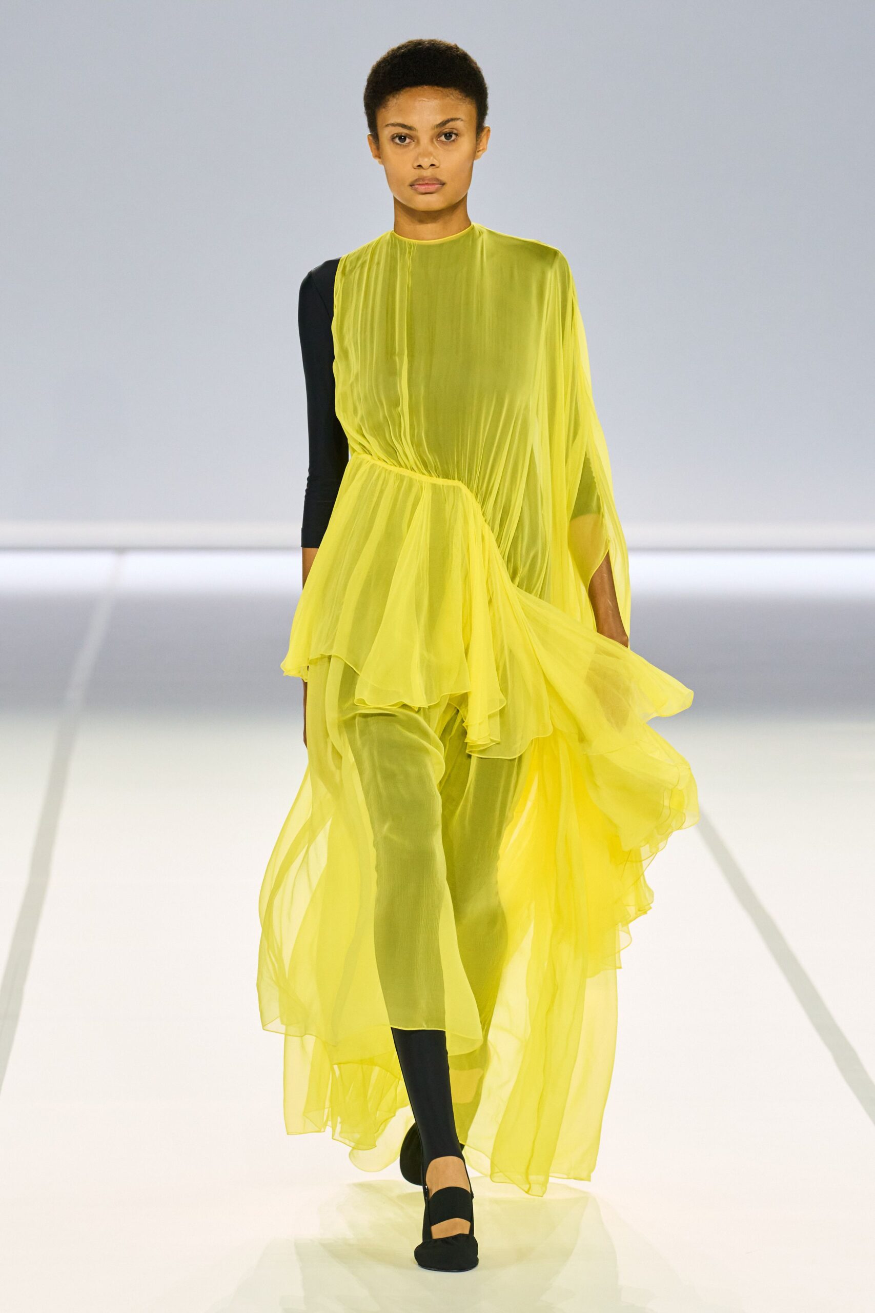 yellow chiffon maxi dress with black pants