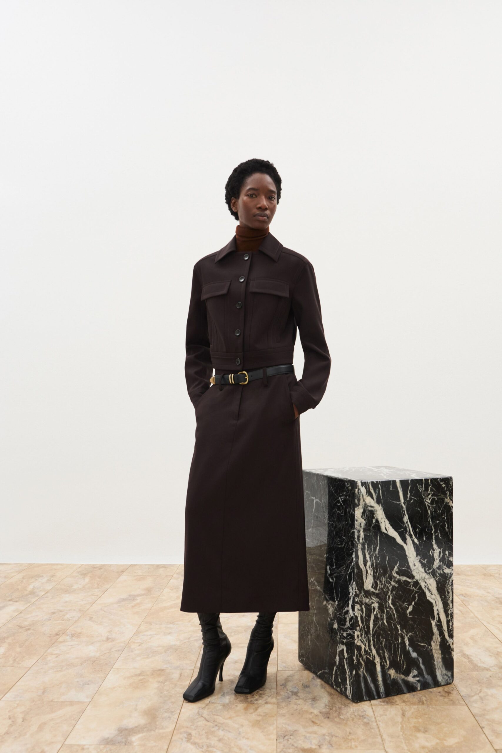 black fitted midi dress with boots
