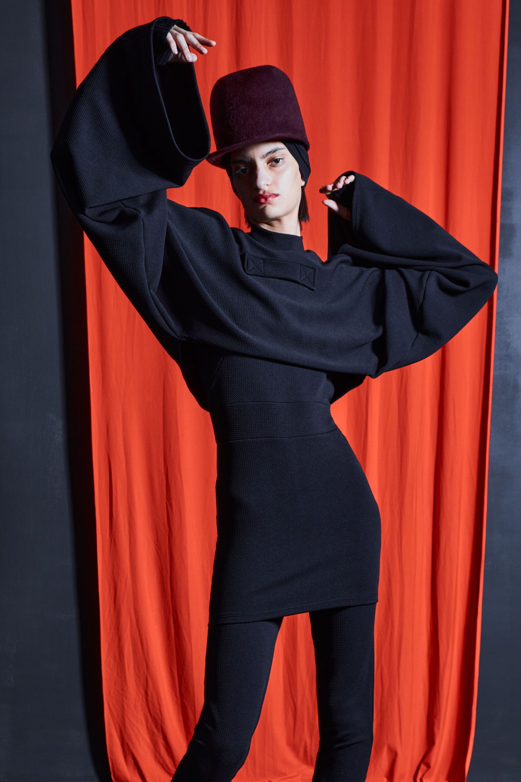 black fitted mini dress with hat