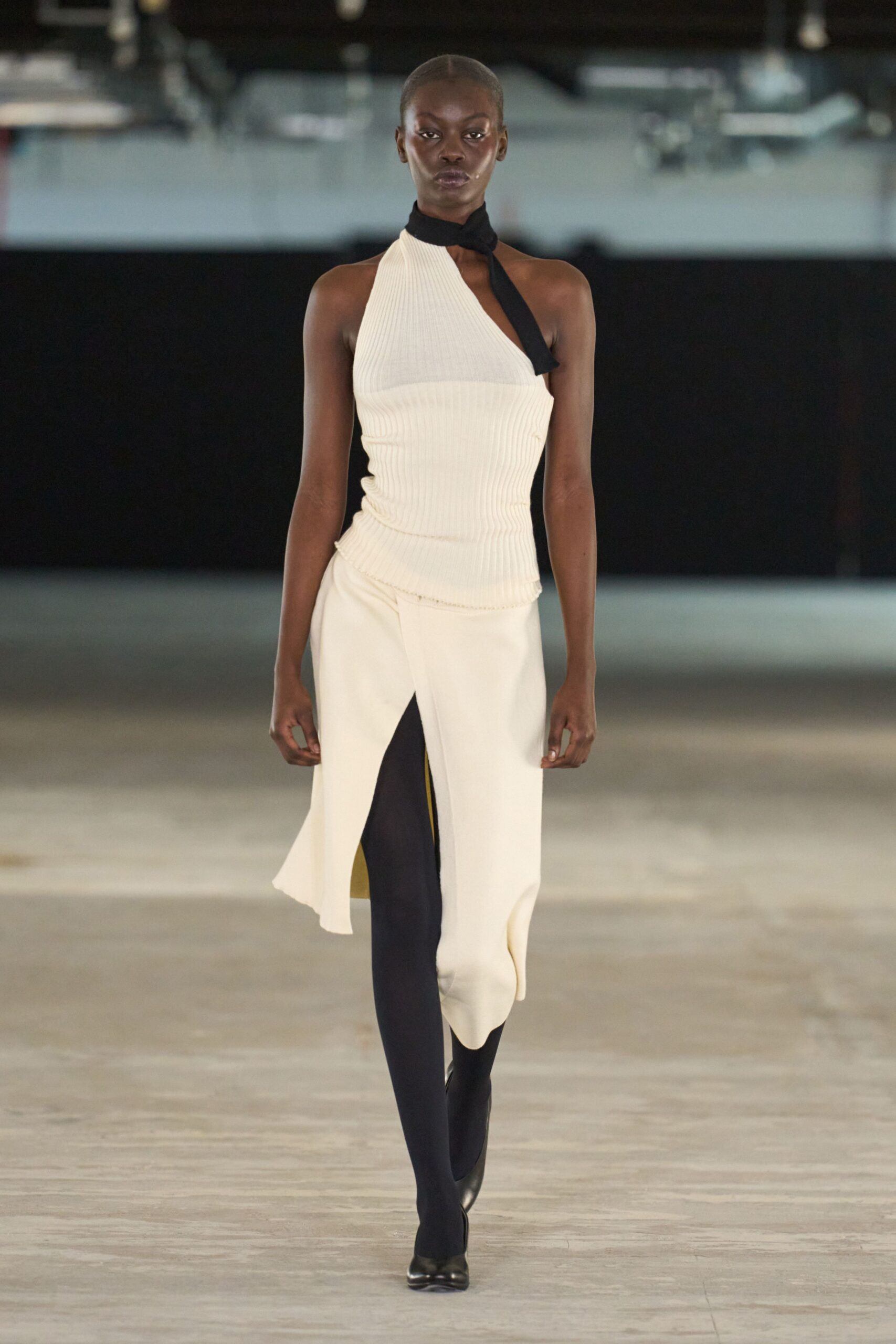 white asymmetric midi dress with black leggings