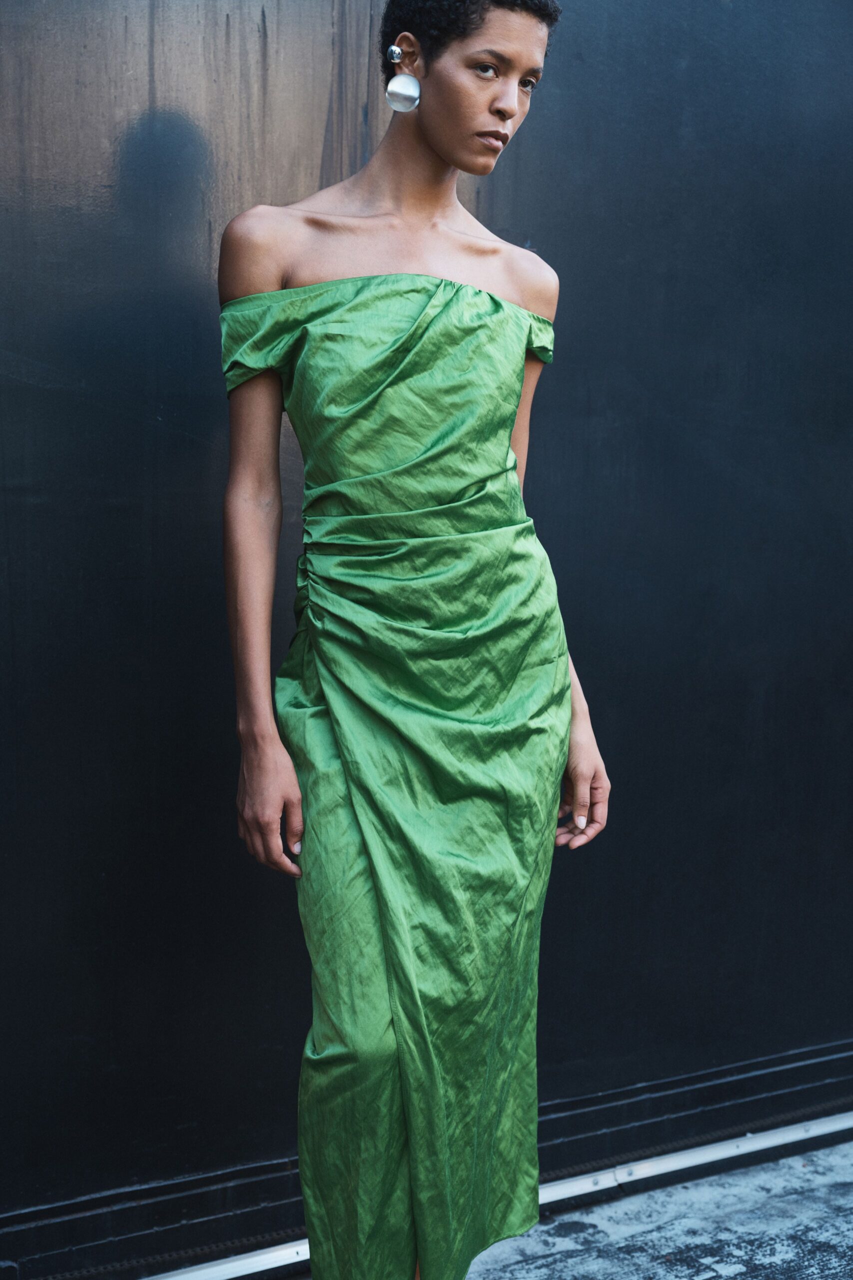 green silk off-shoulder gown