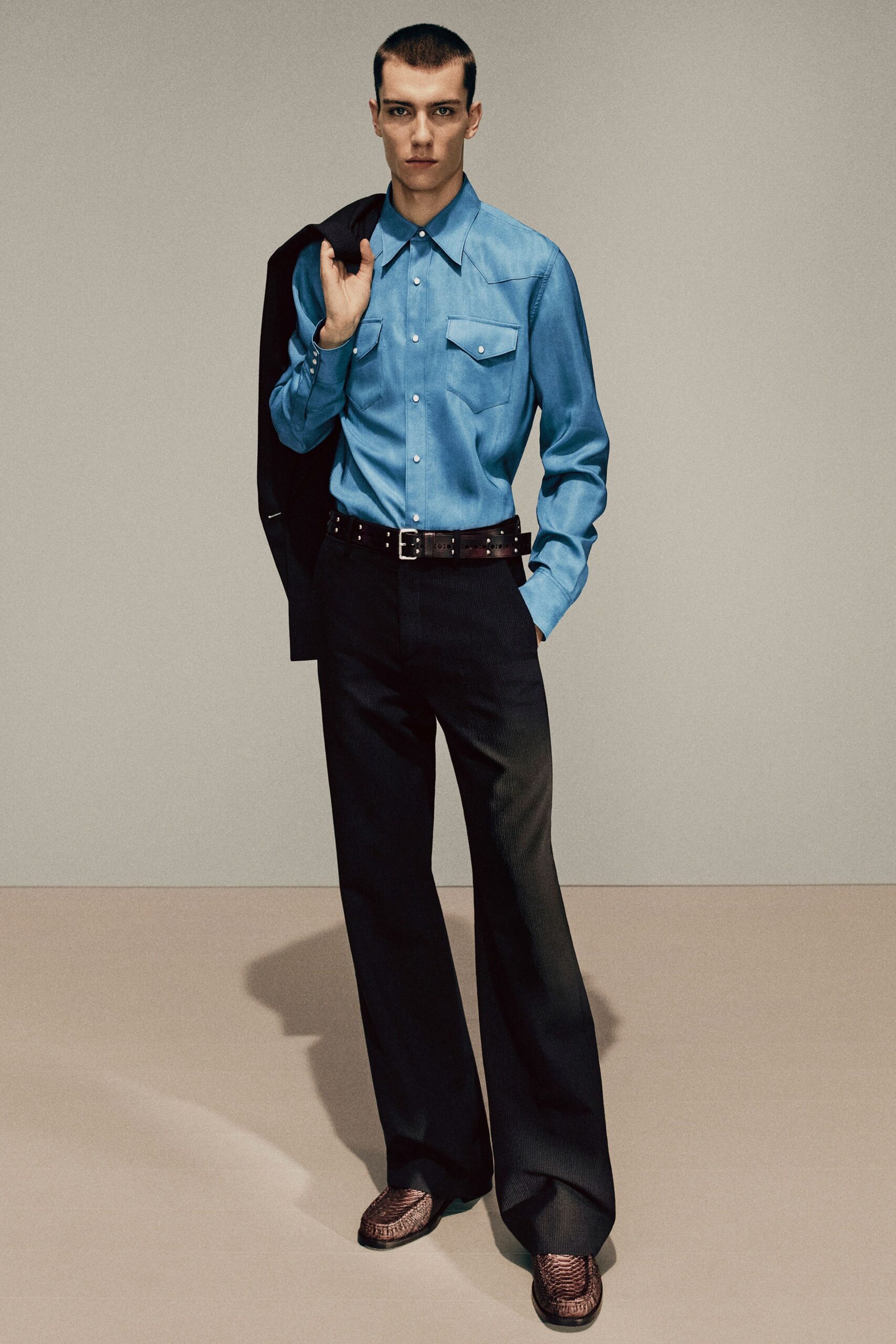 blue cotton shirt with black pants