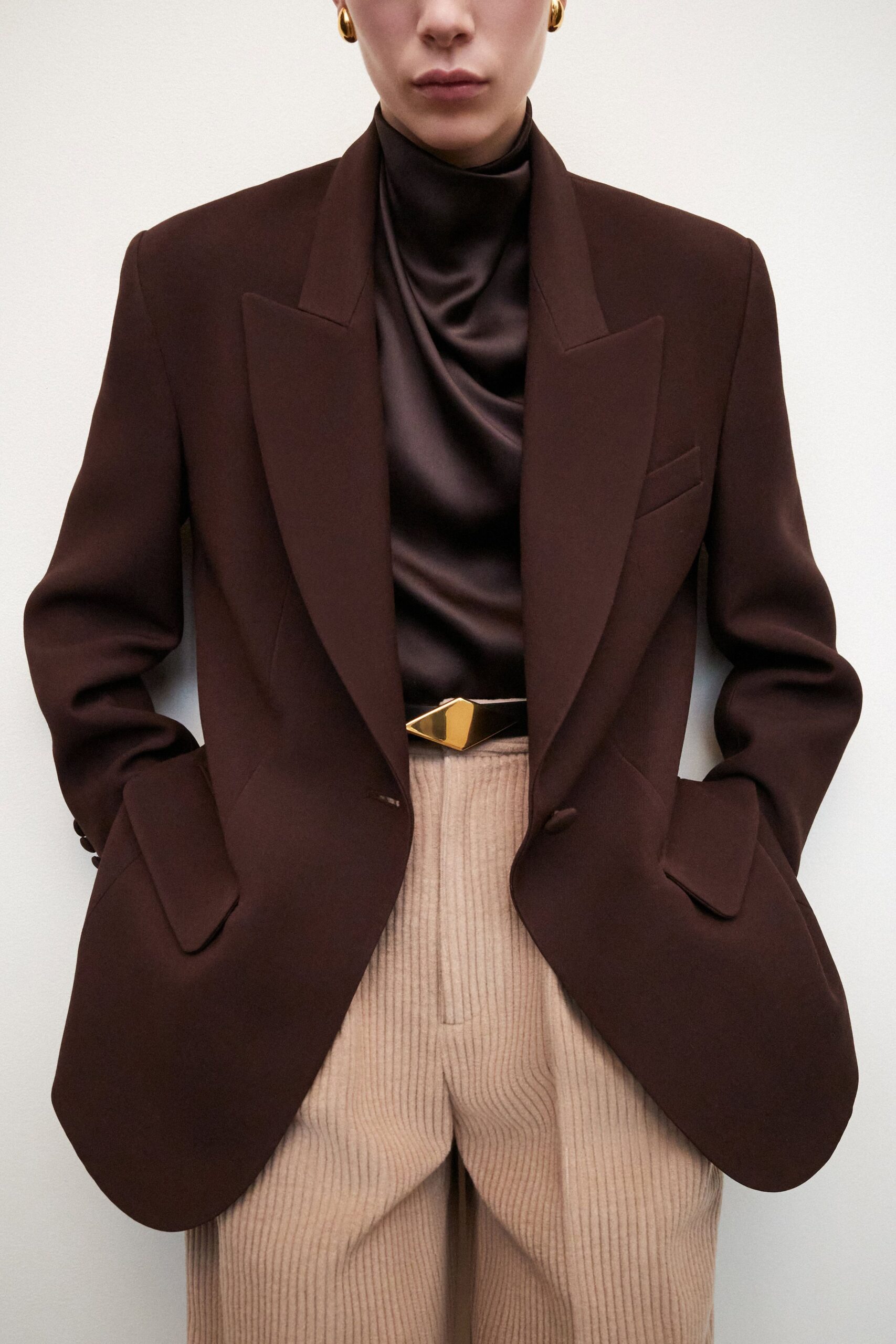 brown tailored blazer with silk top
