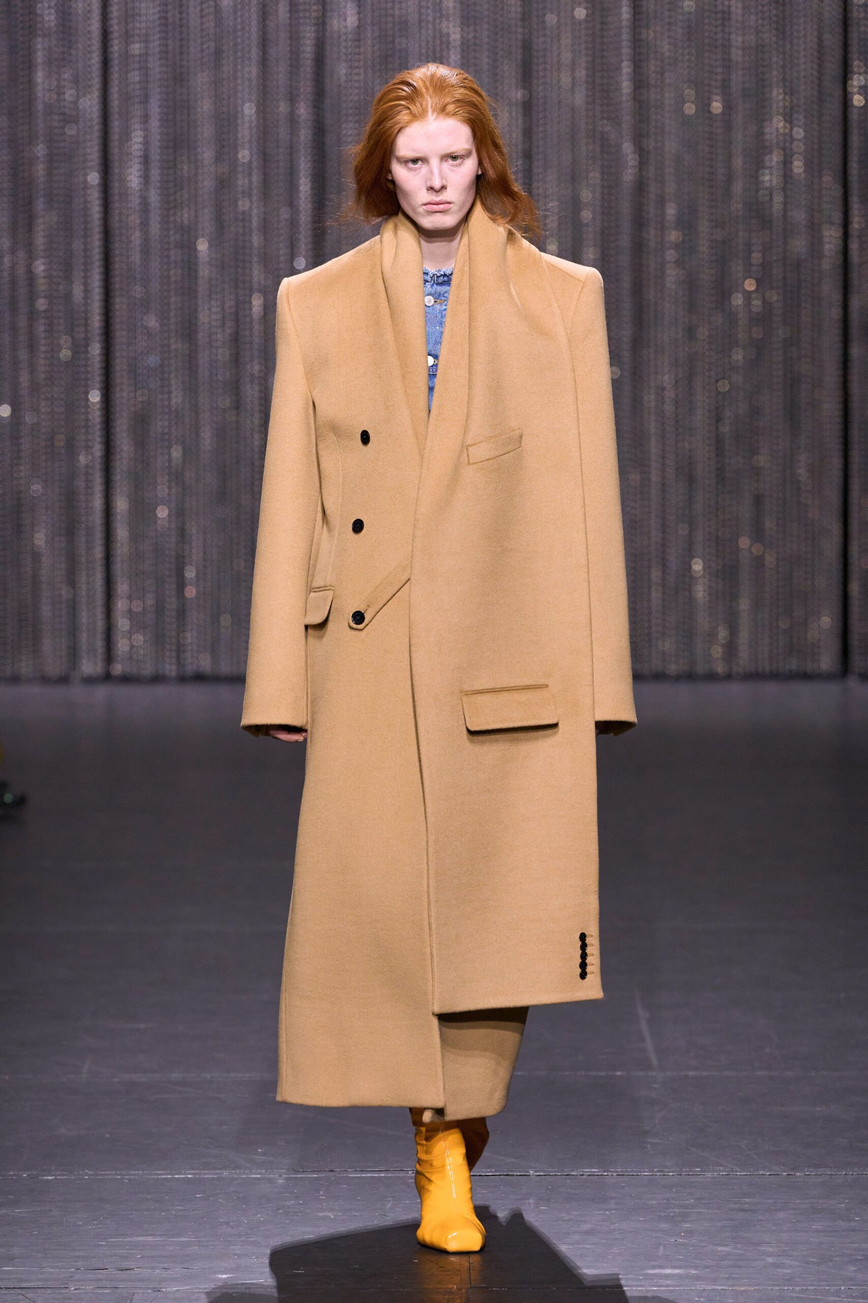 beige oversized wool coat with yellow boots