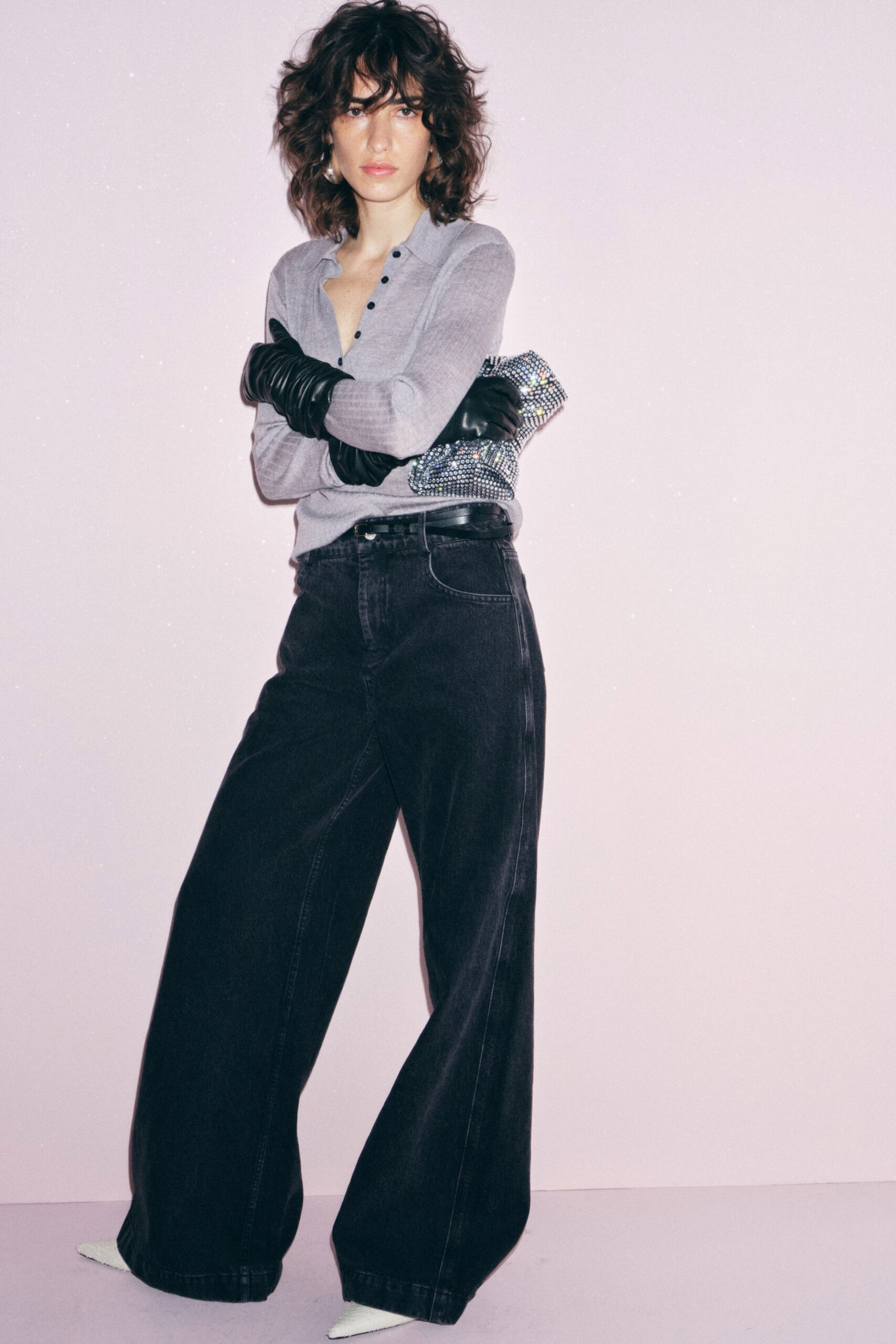 gray relaxed top with black jeans
