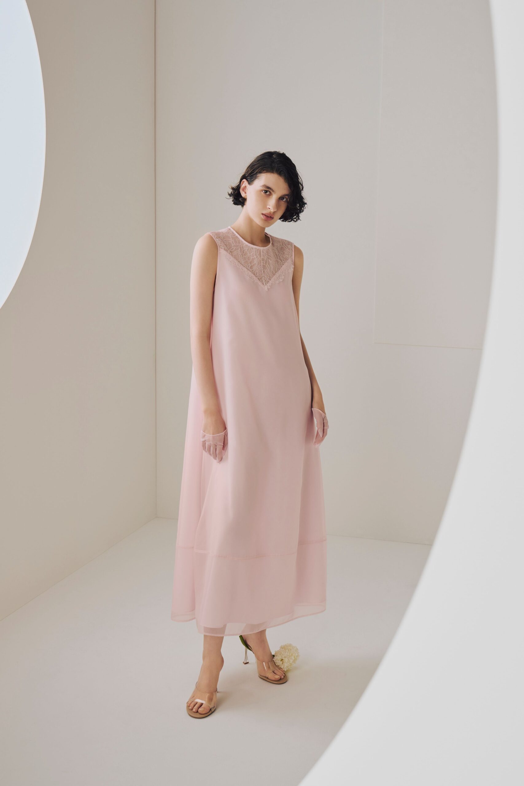 pink silk midi dress with open-toe shoes