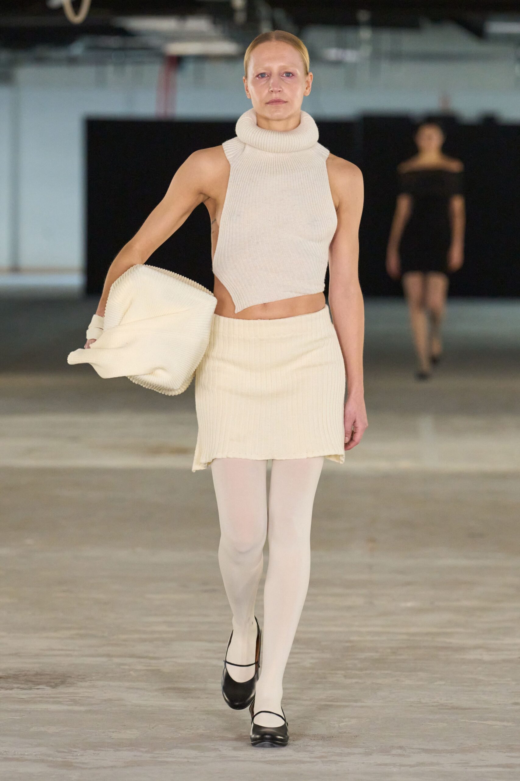 white fitted top and mini skirt