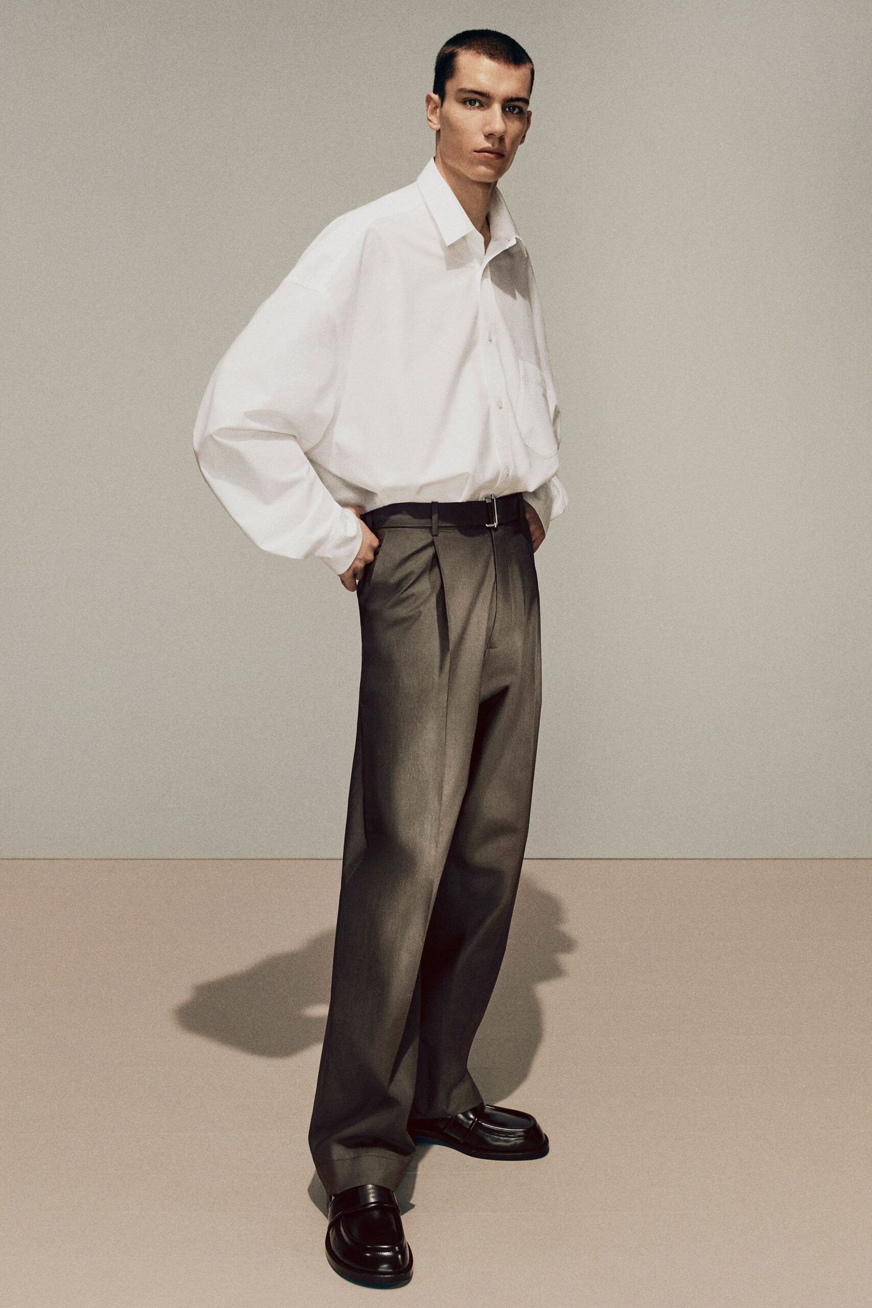 oversized white shirt gray pants