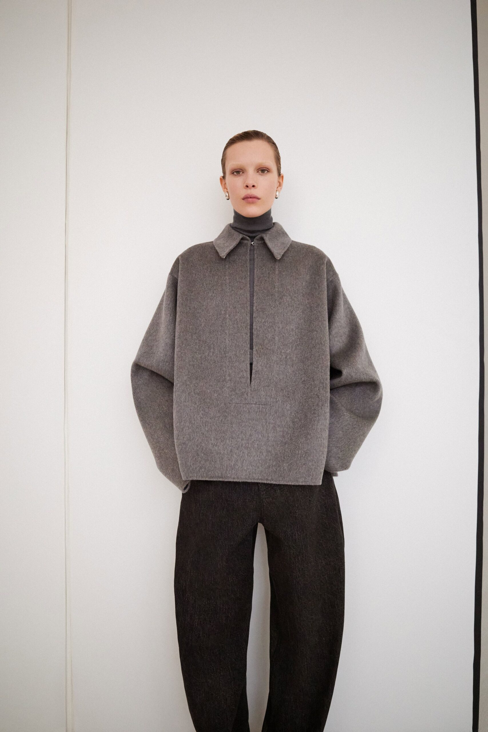 gray oversized wool top with black pants
