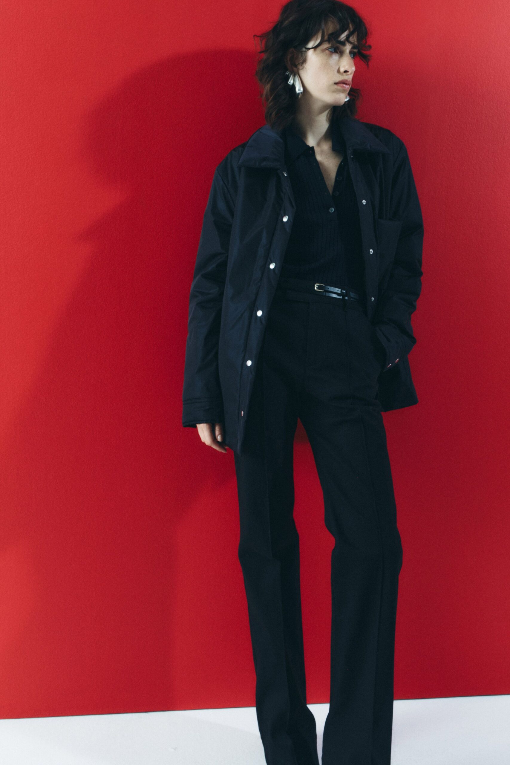 black jacket and tailored pants