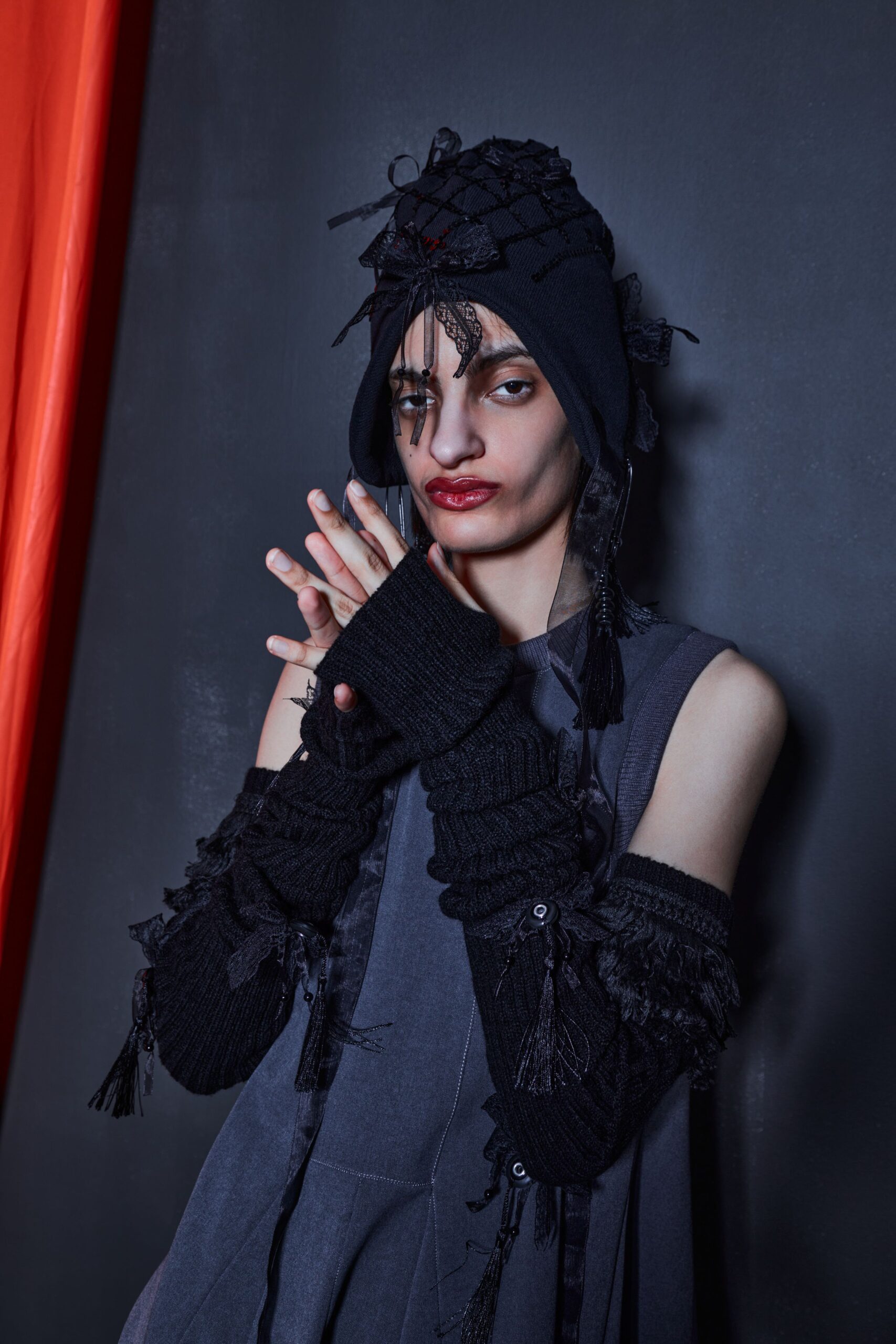 gray relaxed hoodie with black hat and gloves