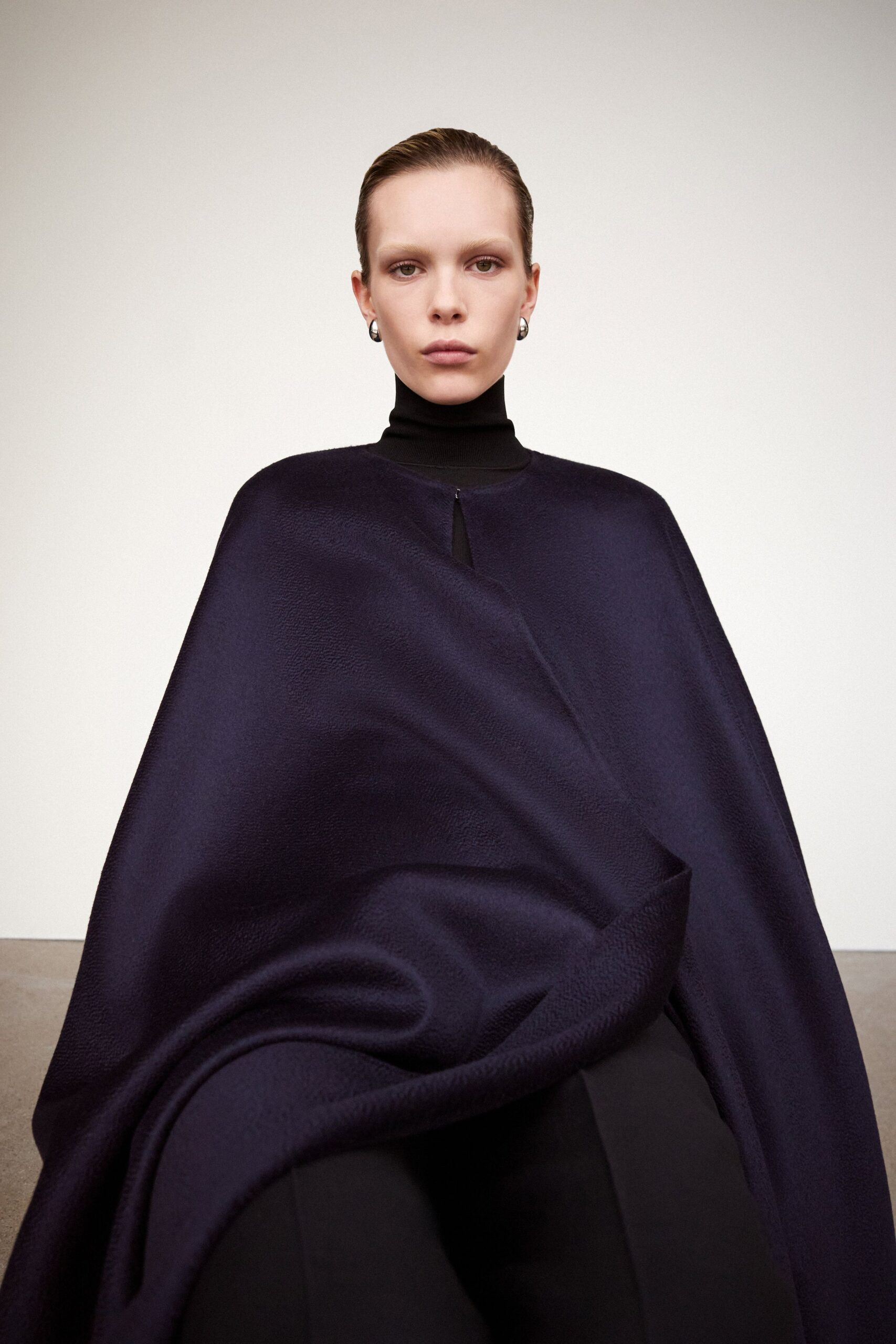 black wool cape and top
