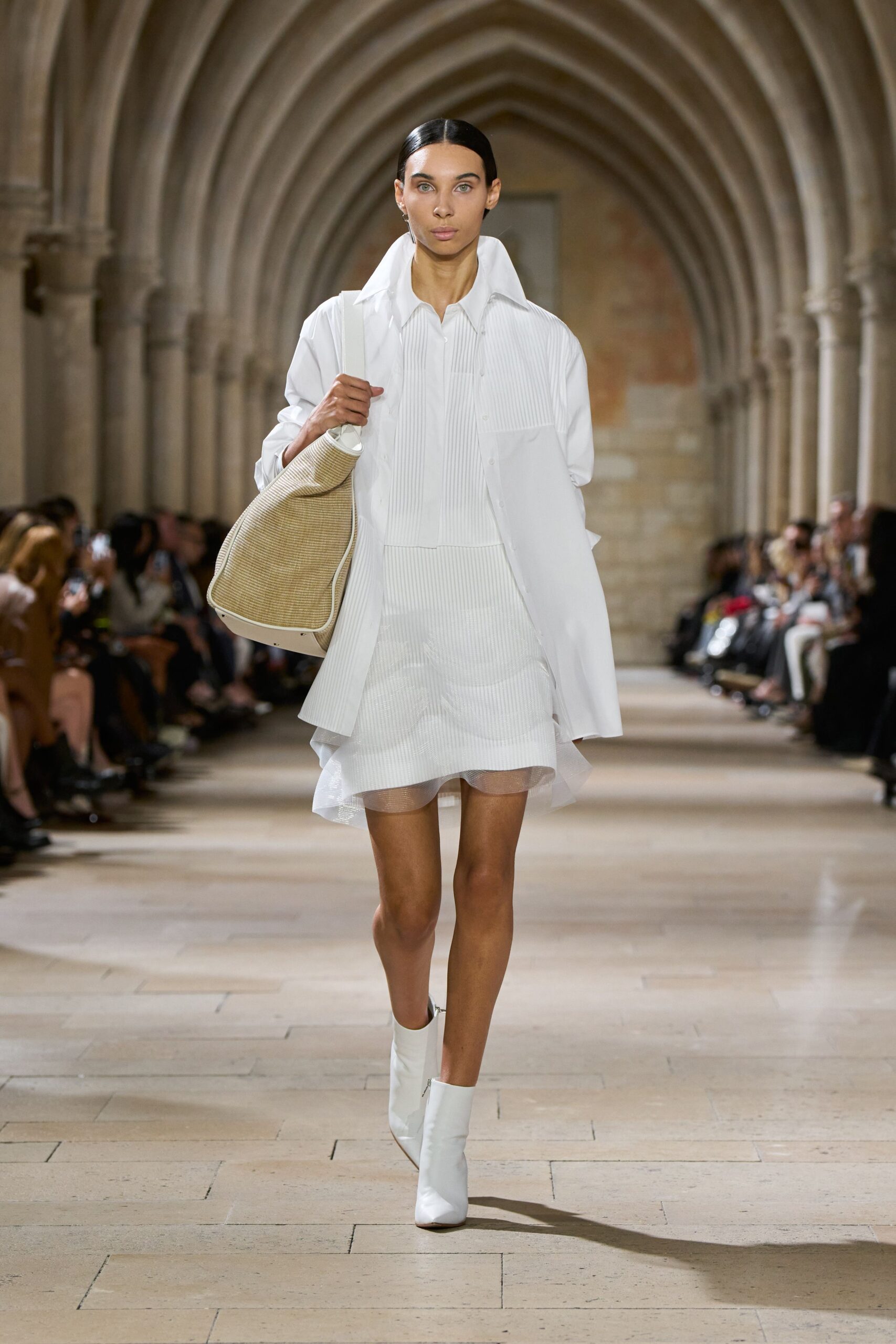 white pleated mini dress with oversized coat