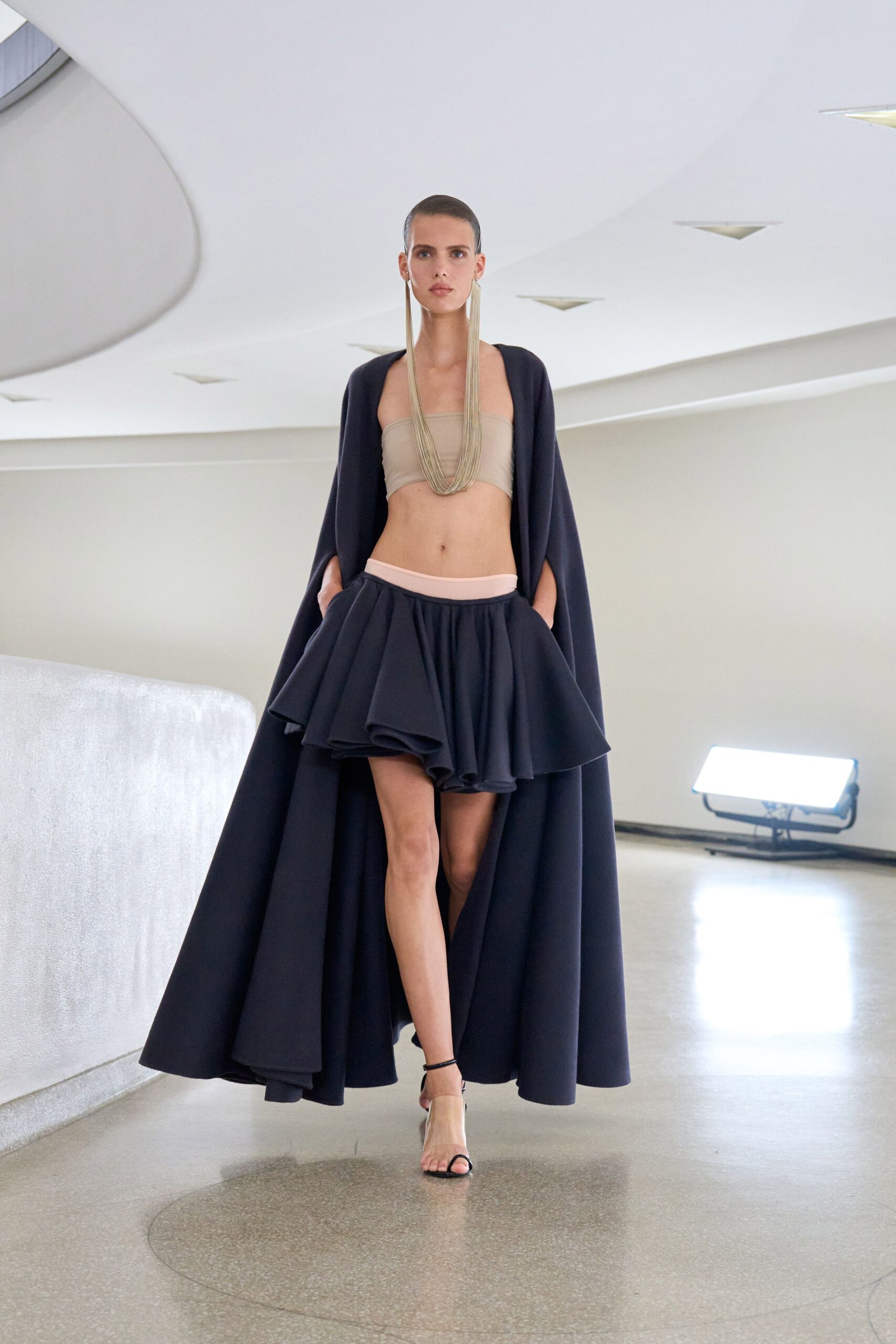 black cotton fitted high-waisted flared pleated mini skirt