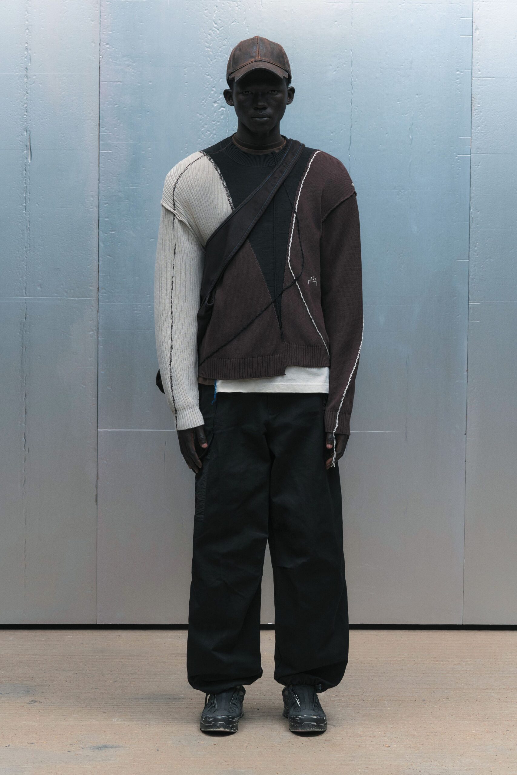 black cotton long-sleeve collared relaxed color-blocked sweater