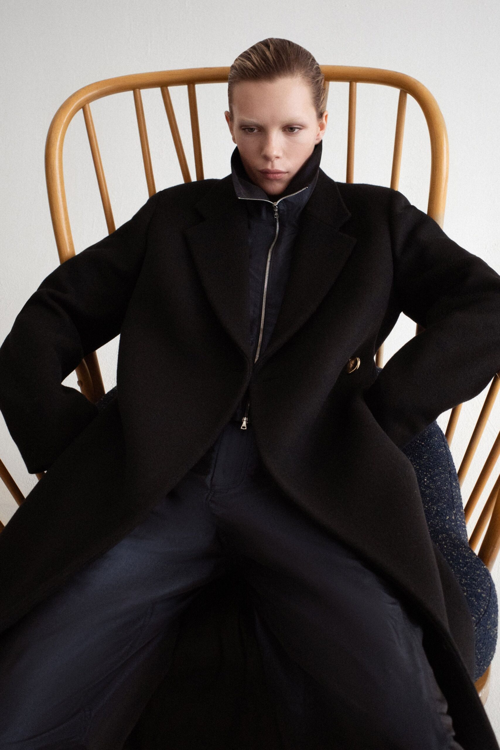 black wool coat and jumpsuit