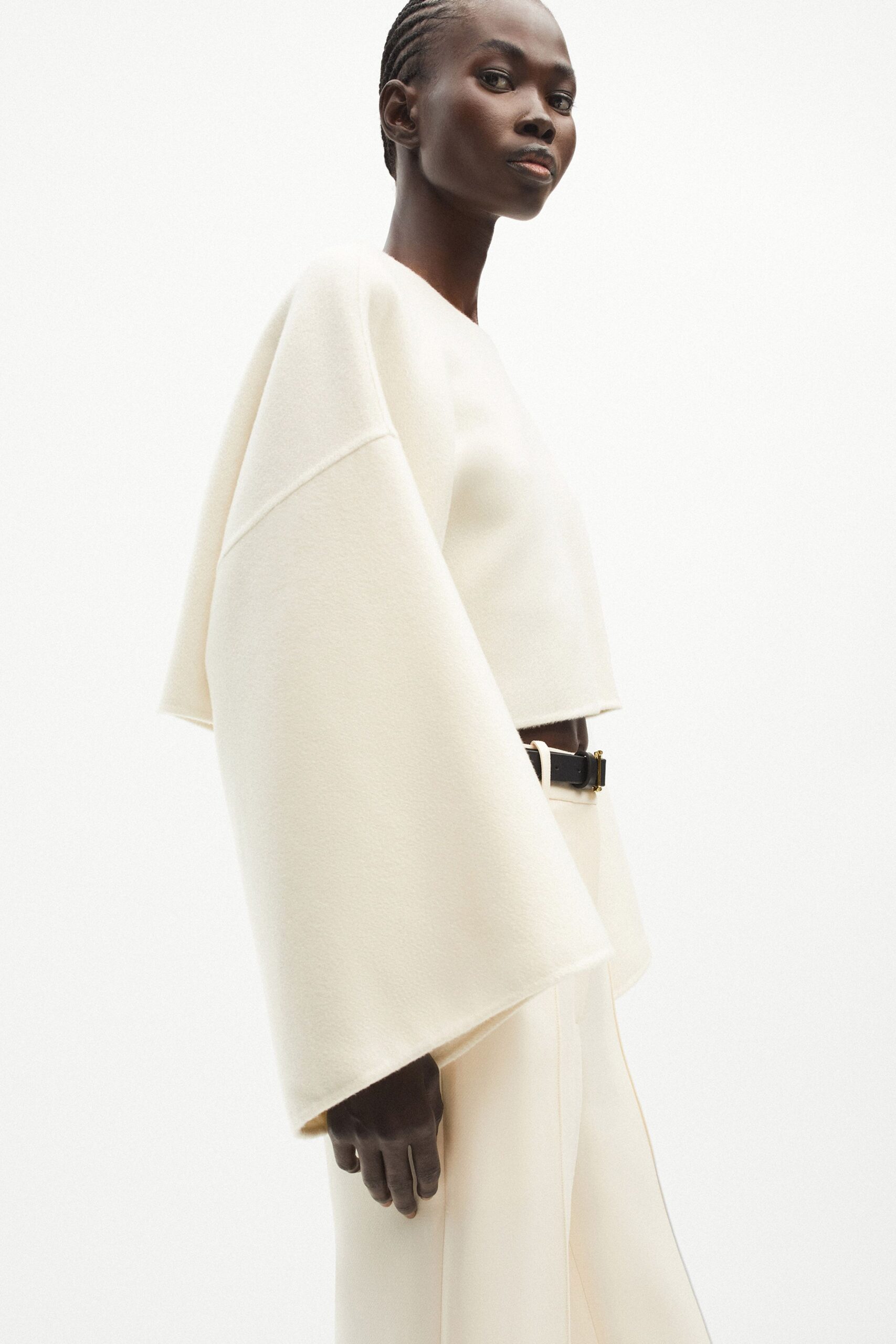 white wool long-sleeve relaxed layered top