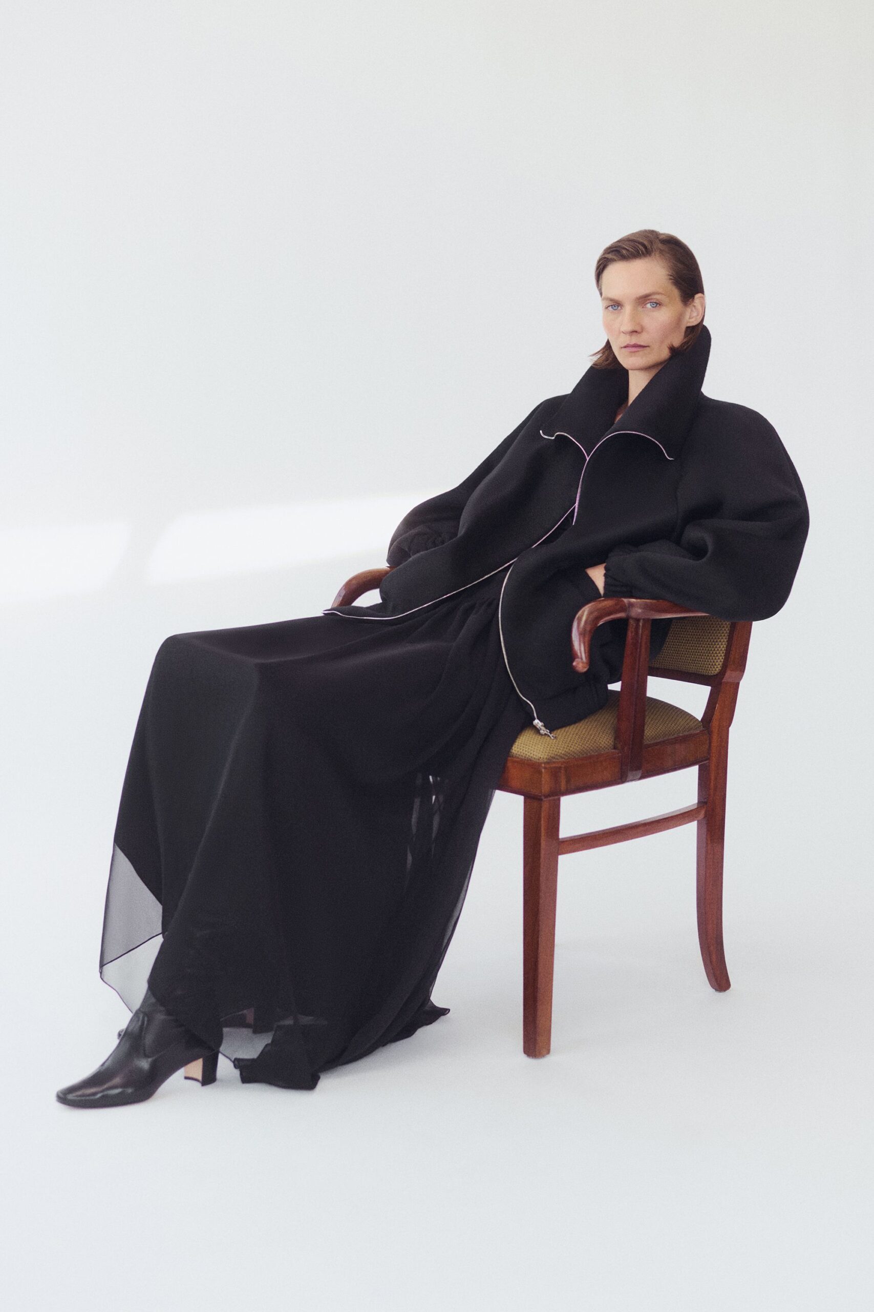 black wool long-sleeve high-neck oversized draped layered coat