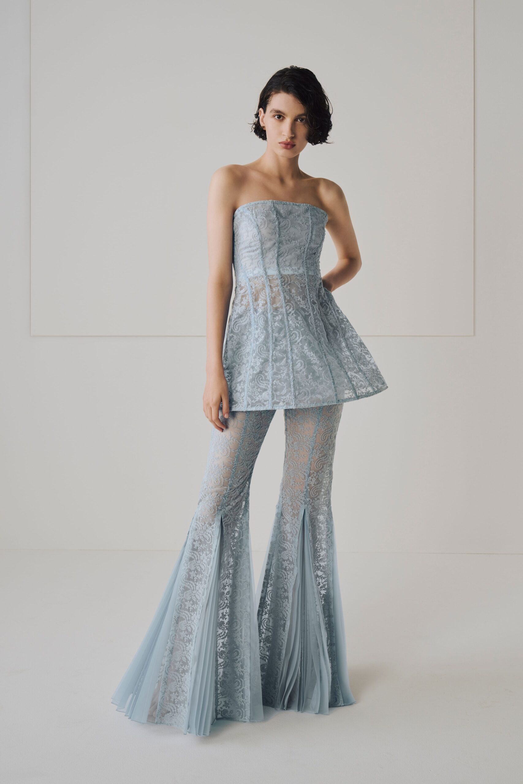 blue lace strapless top and flared pants