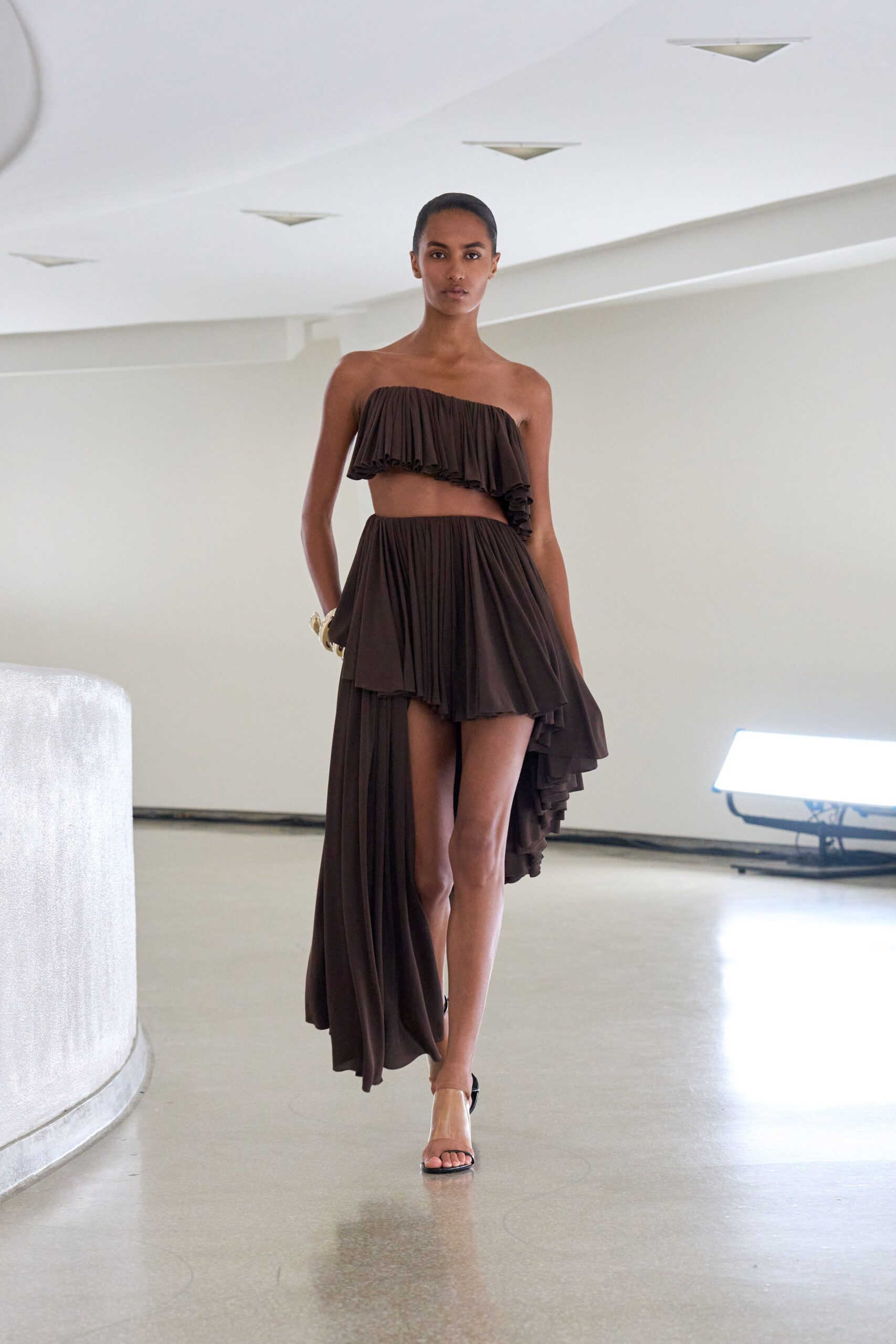 brown silk sleeveless off-shoulder fitted pleated draped dress