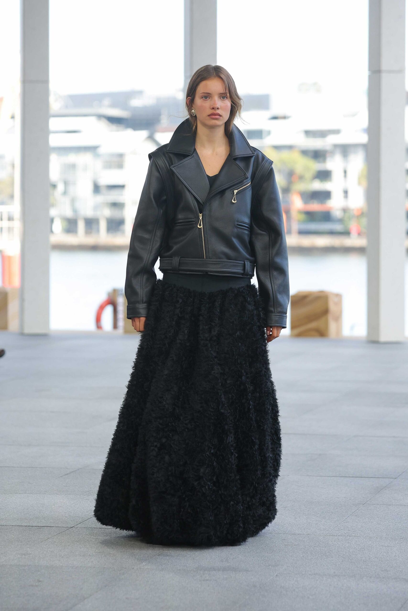 black leather long-sleeve collared structured zippered pockets jacket